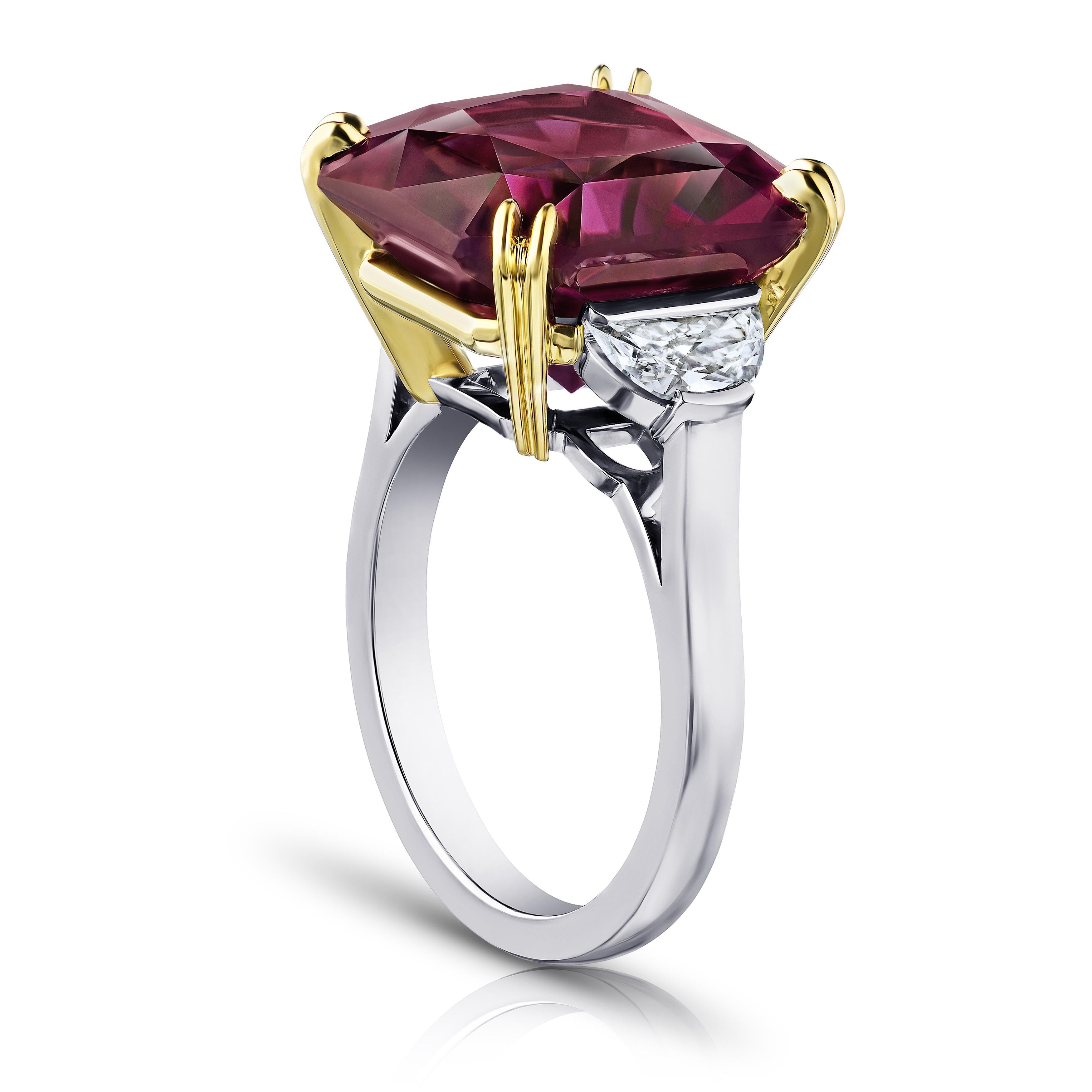 14.61 carat radiant cut purple spinel with half moon diamonds .67 carats set in a platinum ring. Size 7.
