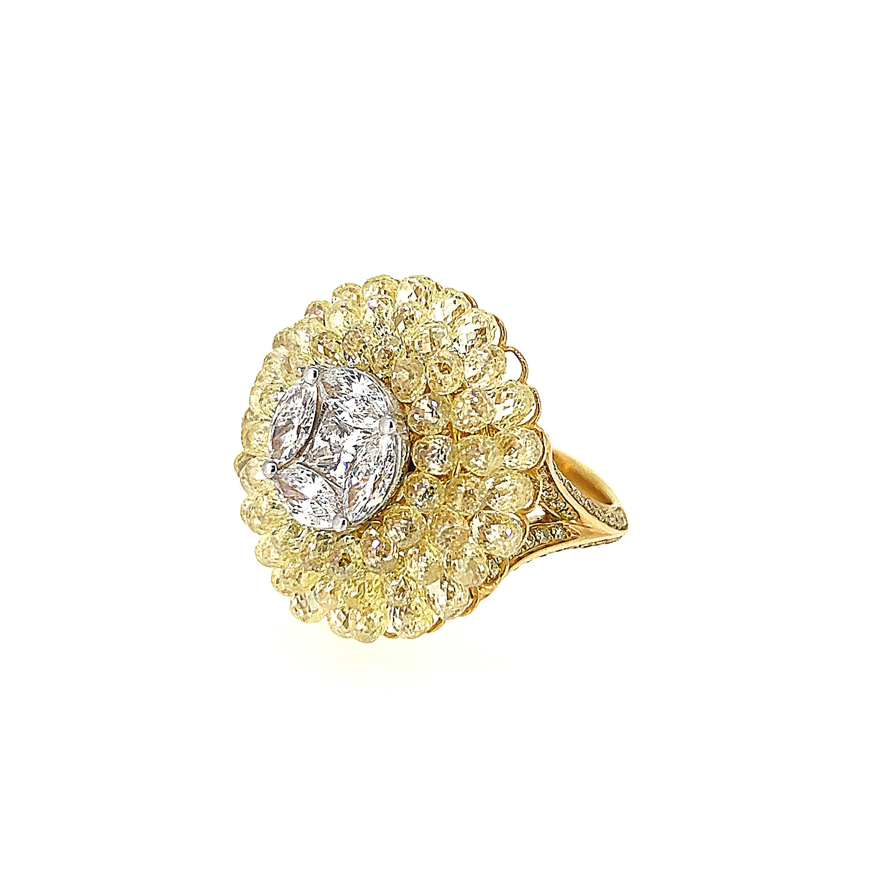 This is a captivating Yellow Diamond and Diamond Flower Ring which is a perfect balance of style and grace.  Set with radiant 4 Marquise cut Diamonds and 1 Princess cut Diamonds at the center, it features 150 pieces of dazzling Briolette Yellow