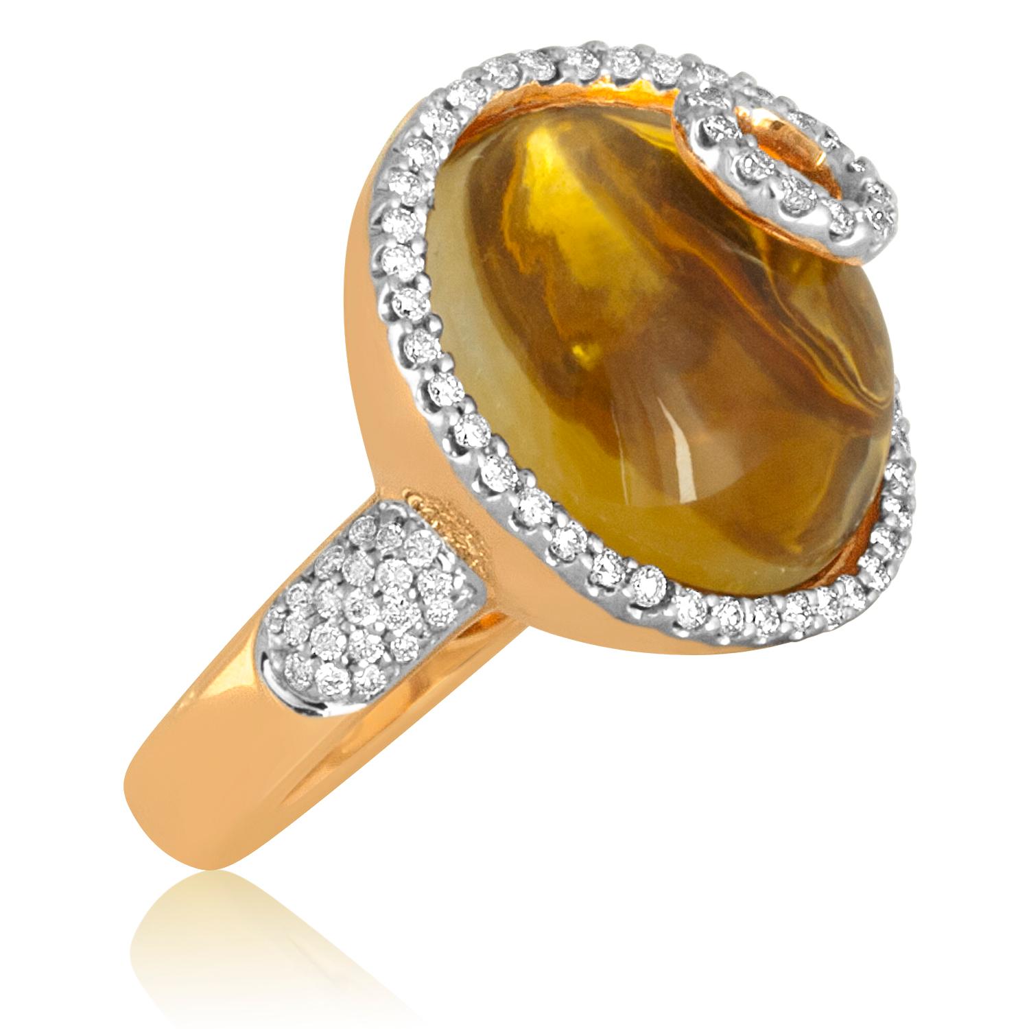 Beautiful Statement Ring
The ring is 14K Yellow Gold.
The Center Stone is a Cabochon Citrine 14.65 Carats
There are 0.70 Carats in Diamonds H/I SI
The top of the ring measures 0.75