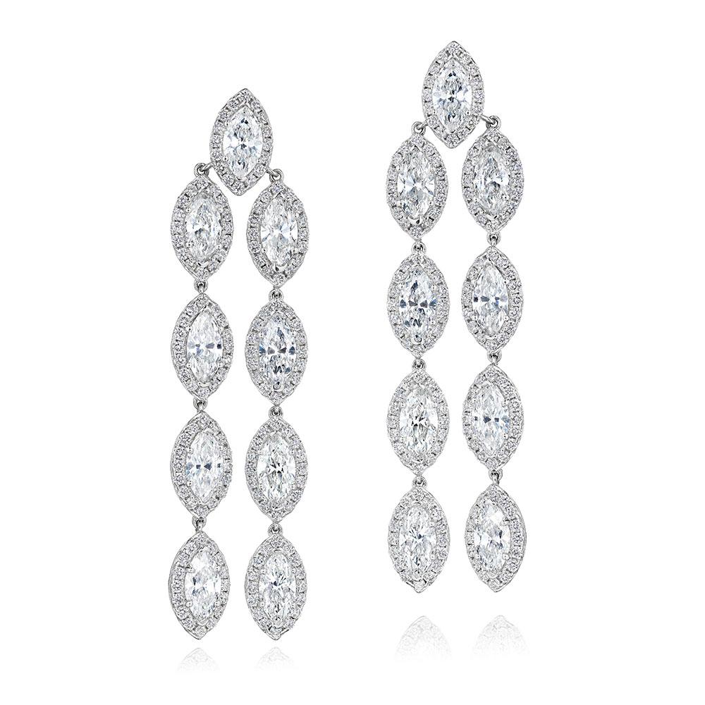 •	18KT White Gold
•	14.65 Carats
•	Sold as a pair

•	Number of Marquise Diamonds: 18
•	Carat Weight: 11.90ctw

•	Number of Round Diamonds: 288
•	Carat Weight: 2.75ctw

•	This pair of earrings contains 18 marquise cut diamonds, framed individually by