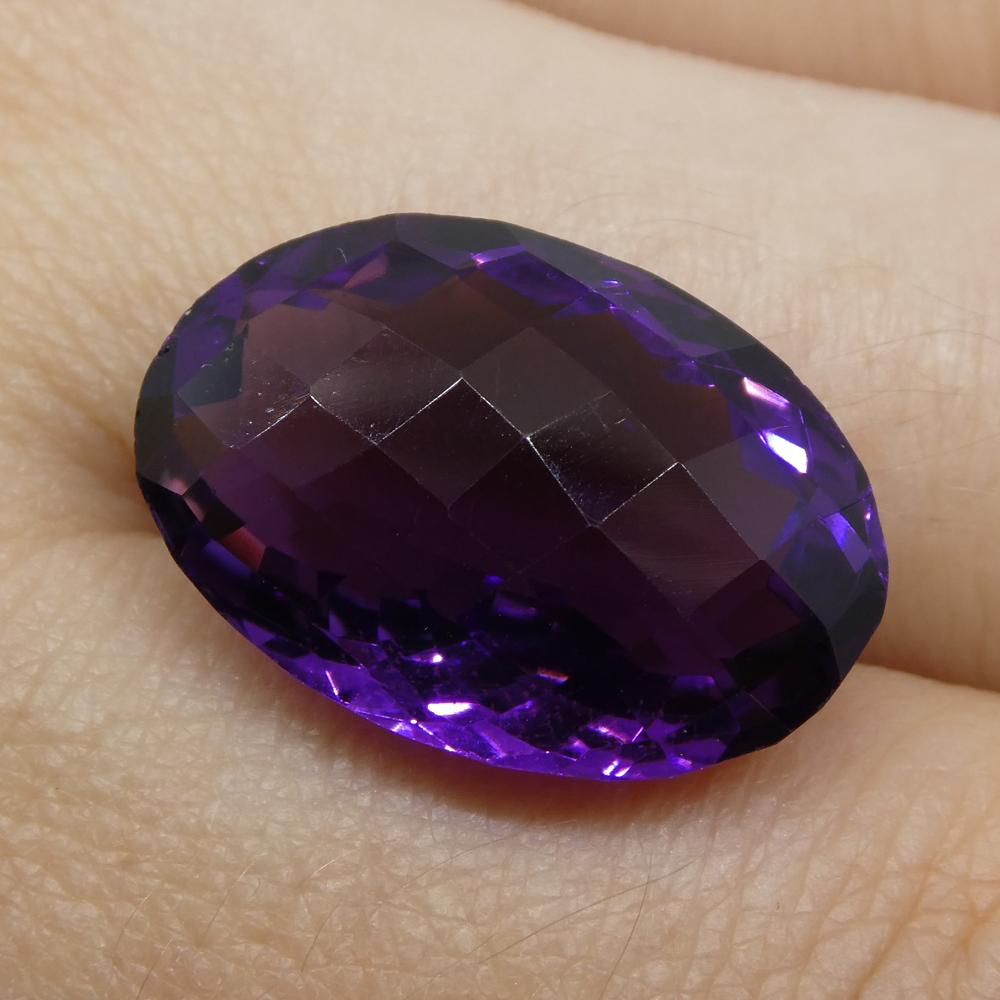 Description:

Gem Type: Amethyst
Number of Stones: 1
Weight: 14.66 cts
Measurements: 19.50x13.20x9.80 mm
Shape: Oval Checkerboard
Cutting Style Crown: Checkerboard
Cutting Style Pavilion: Modified Brilliant
Transparency: Transparent
Clarity: Very
