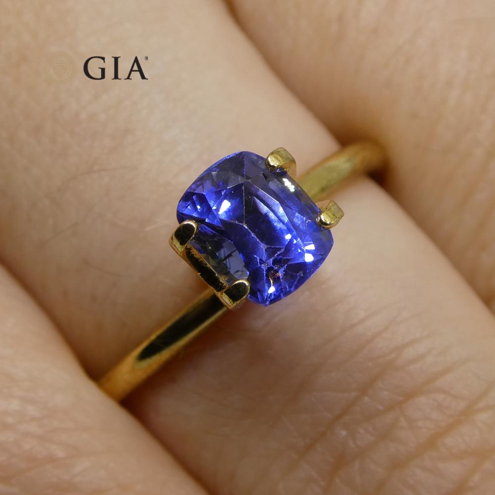 This is a stunning GIA Certified Sapphire

The GIA report reads as follows:

GIA Report Number: 2201981016
Shape: Cushion
Cutting Style:
Cutting Style: Crown: Modified Brilliant Cut
Cutting Style: Pavilion: Step Cut
Transparency: Transparent
Color: