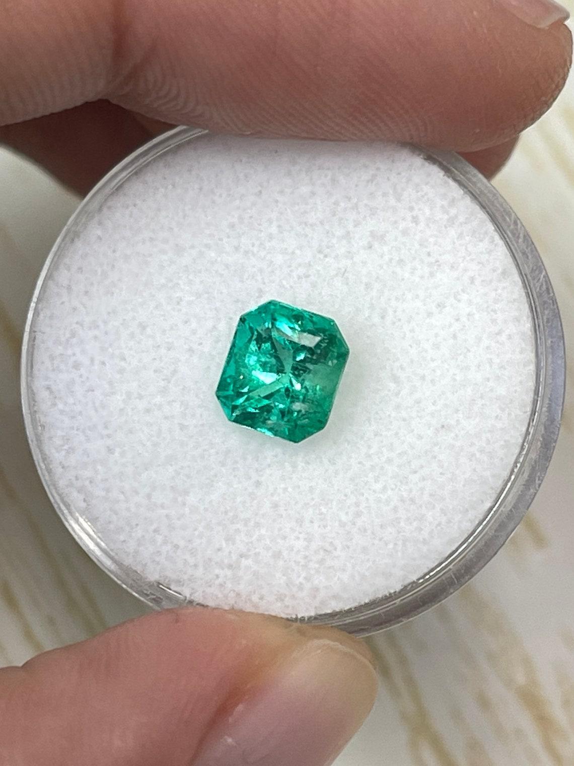 Modern 1.46ct GIA Certified Bluish Green Emerald Cut Colombian Gem 7x6 Genuine May For Sale
