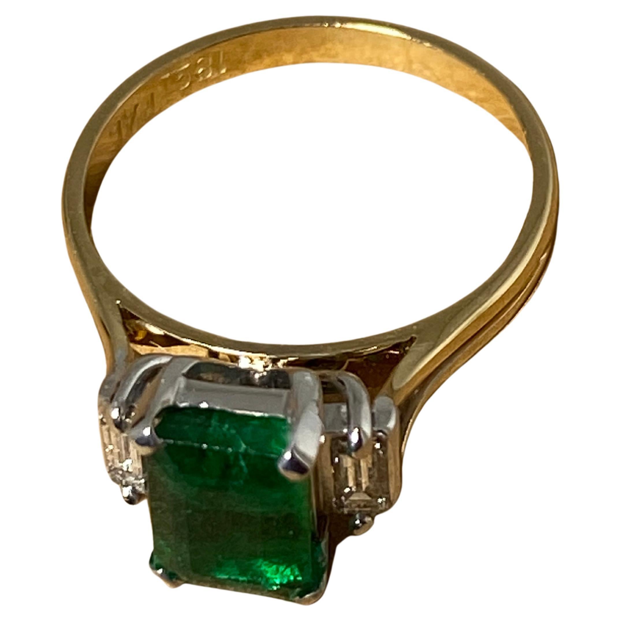 This magnificent piece of jewellery is 
handmade, dating from 1980's. 

It features top quality Natural Emerald
of Colombian origin, 
of vivid intense deep green colour
(the best colour an emerald could have) & 
excellent clarity 
of 1.46ct (8mm x