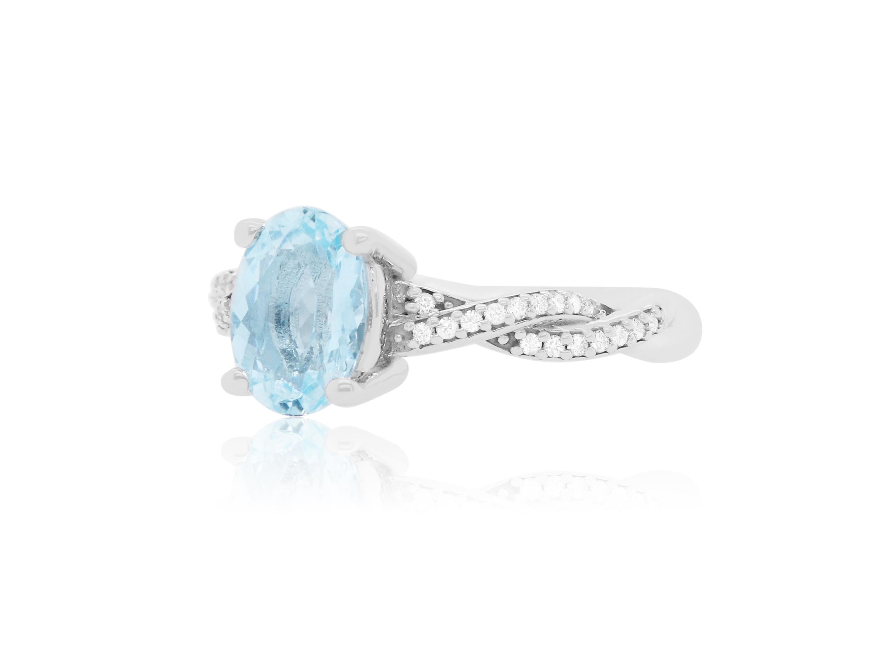 Material: 14k White Gold 
Center Stone Details: 1.47 Carat Oval Shaped Aquamarine - Measuring 9 x 6 mm
Diamond Details: 34 Brilliant Round White Diamonds at Approximately 0.13 Carats - Clarity: SI / Color: H-I
Size 6.75. Complimentary sizing on all