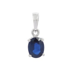 1.47 Carats Oval Shape Deep Blue Sapphire Solitaire Pendant in 18K White Gold