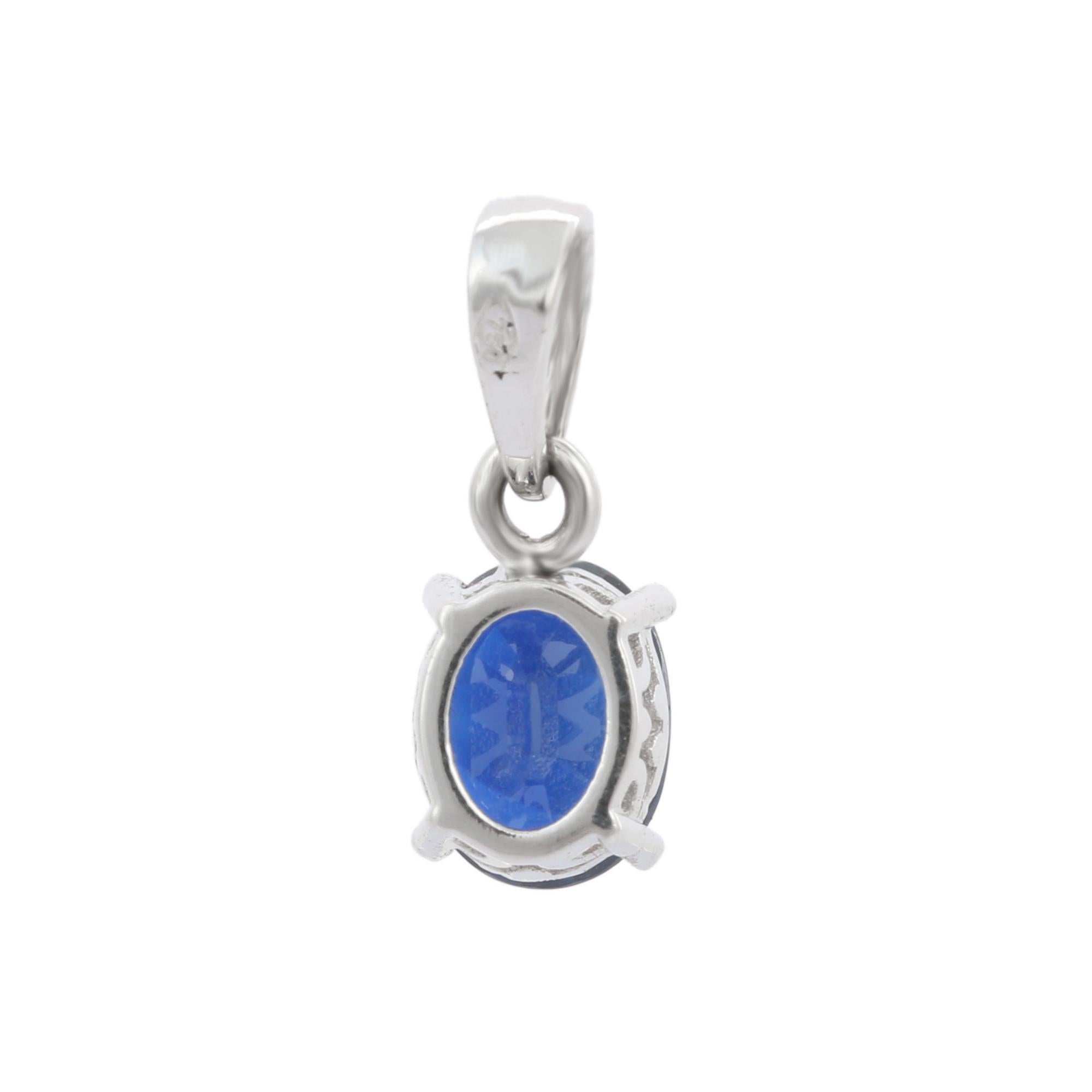 Modern Blue Sapphire Solitaire Pendant in 18K White Gold For Sale