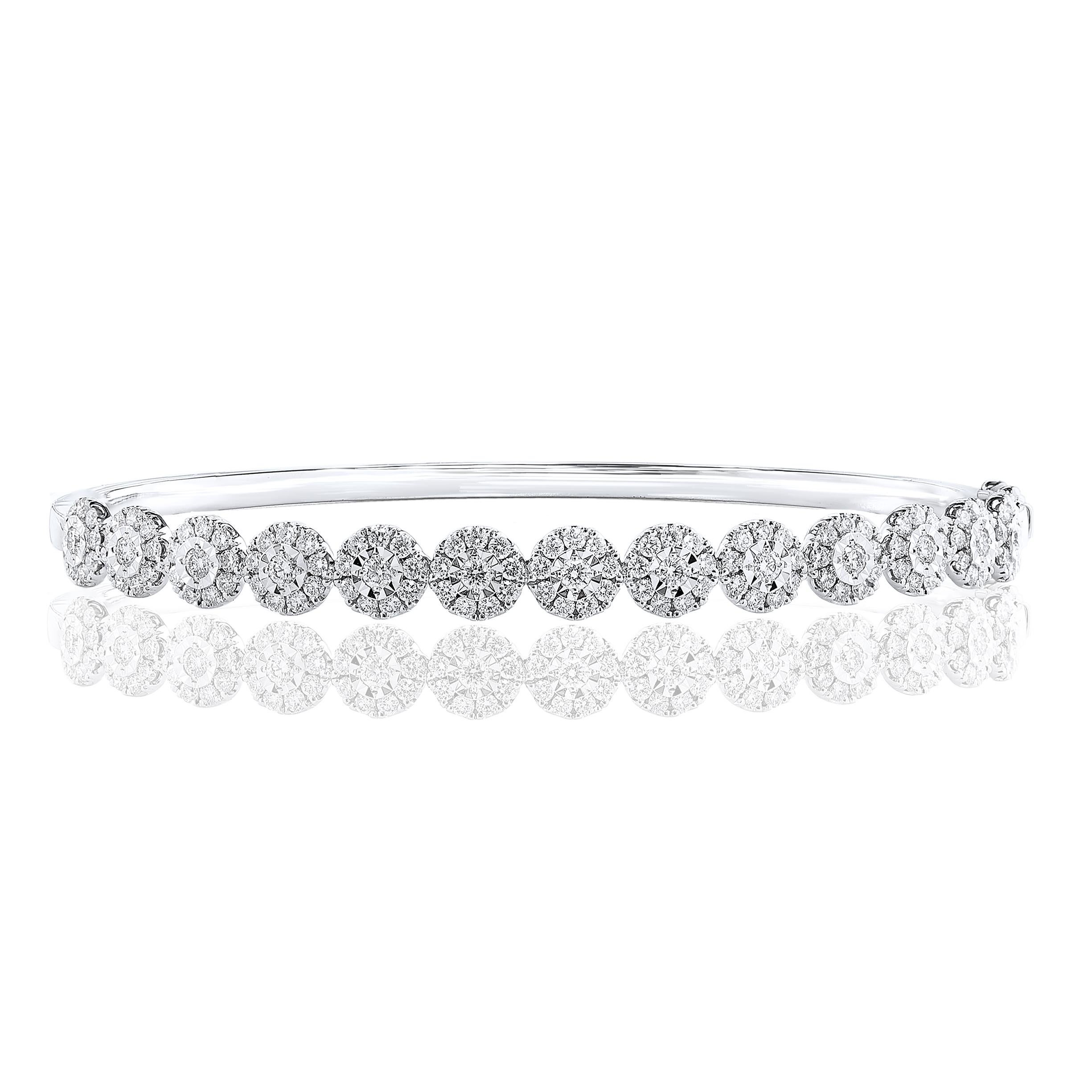 A fashionable bangle showcasing 130 brilliant cut diamonds weighing 1.47 carats total. Set in a polished 18K White Gold mounting. 

Style is available in different price ranges. Prices are based on your selection. Don't hesitate to get in touch with
