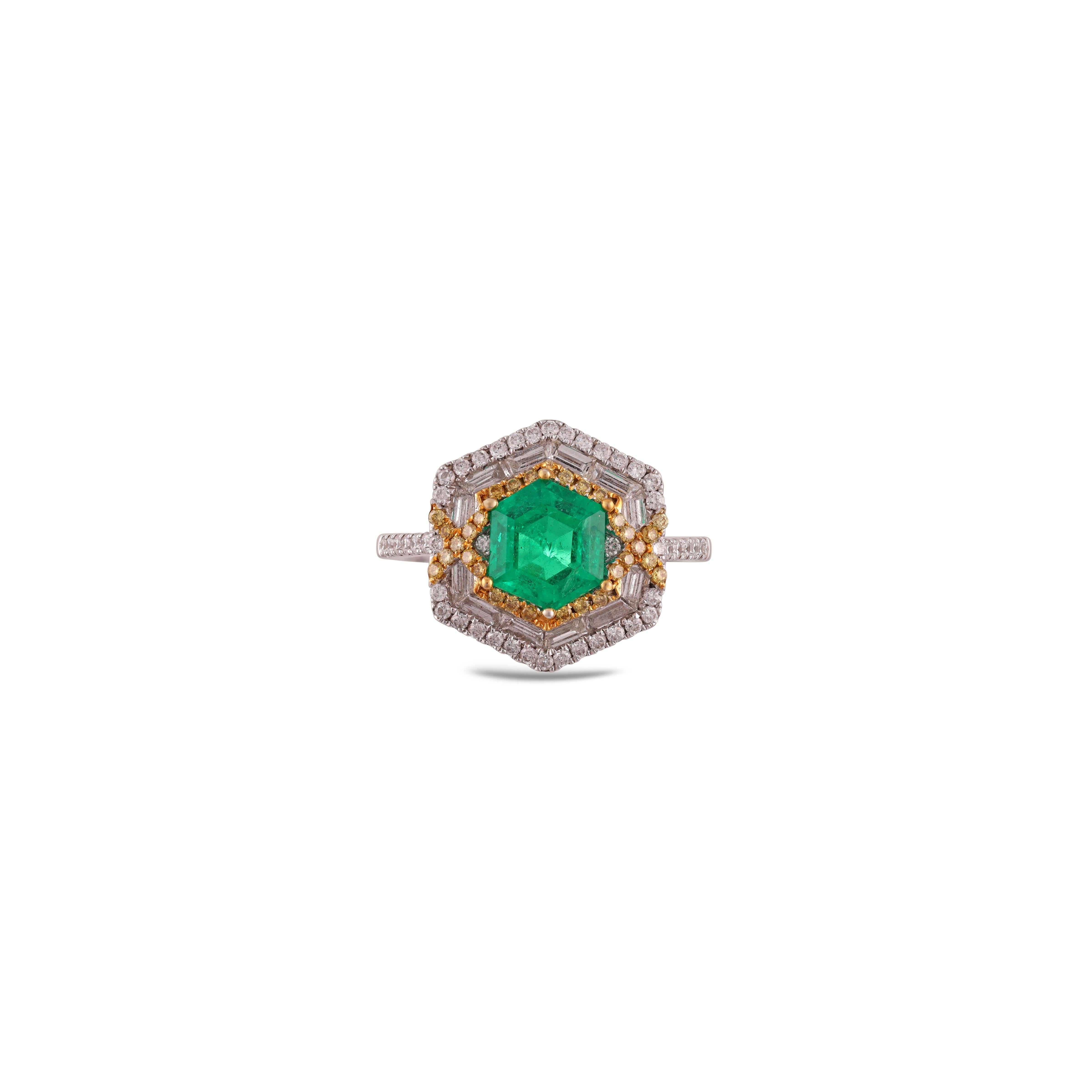 This is an elegant emerald & Fancy diamond ring studded in 18k gold with 1 piece of  Zambian emerald weight 1.47 carat which is surrounded by 90 pieces of diamonds weight 0.97 carat, this entire ring studded in 18k  gold.



 Ring size can be change
