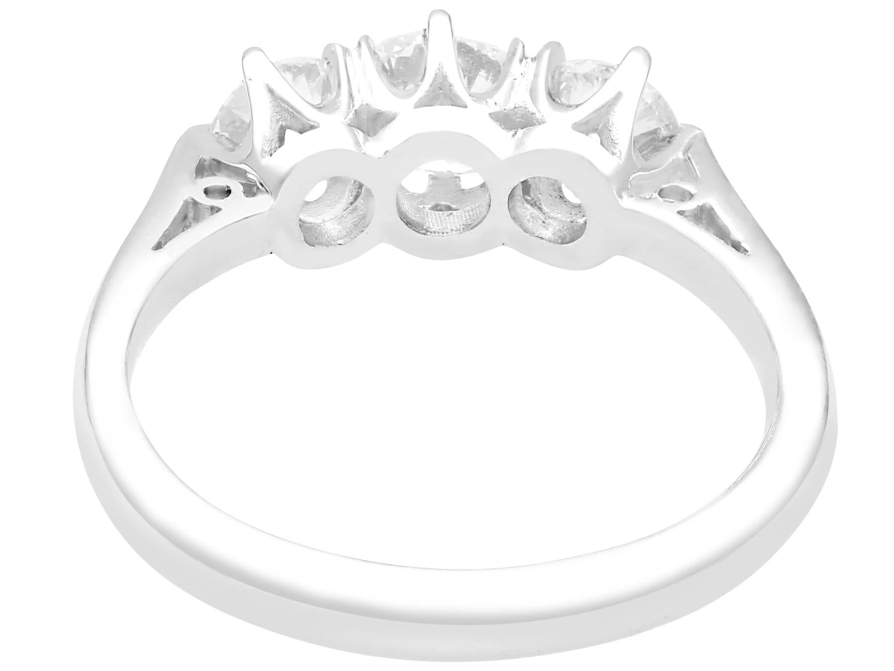 Contemporary 1.47 Carat Diamond Platinum Three-Stone Engagement Ring For Sale