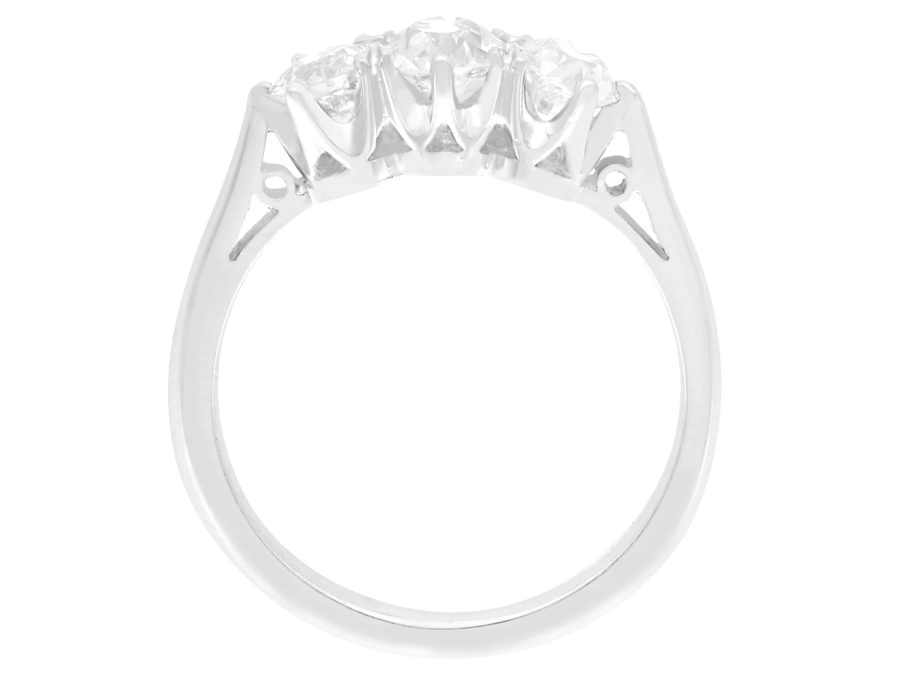 Round Cut 1.47 Carat Diamond Platinum Three-Stone Engagement Ring For Sale