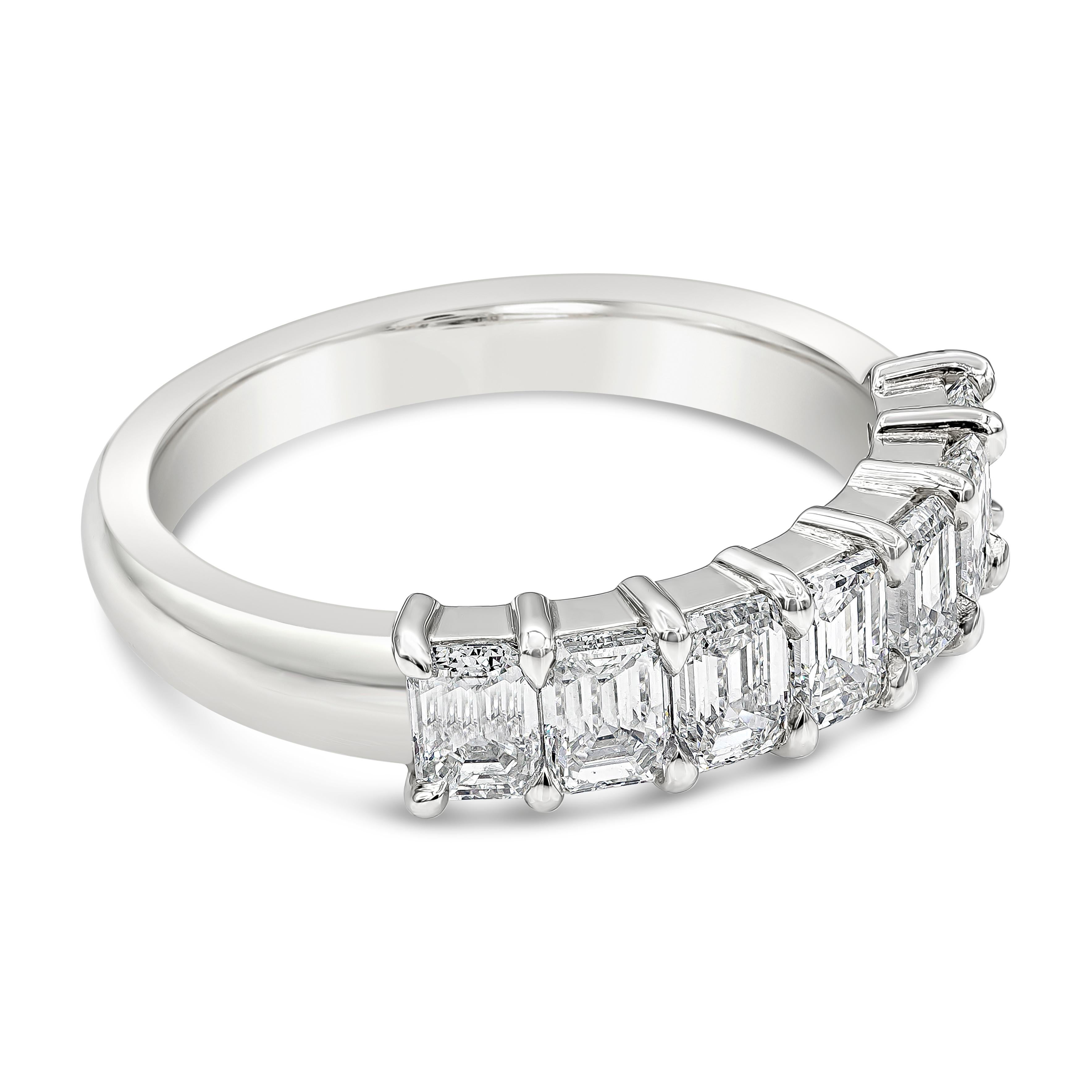 A subtle and elegant wedding band style showcasing seven emerald cut diamonds, set in a closed-gallery mounting made in polished platinum. Diamonds weigh 1.47 carats total and are approximately G-H color, VVS-VS clarity. Size 6 US.

Style available