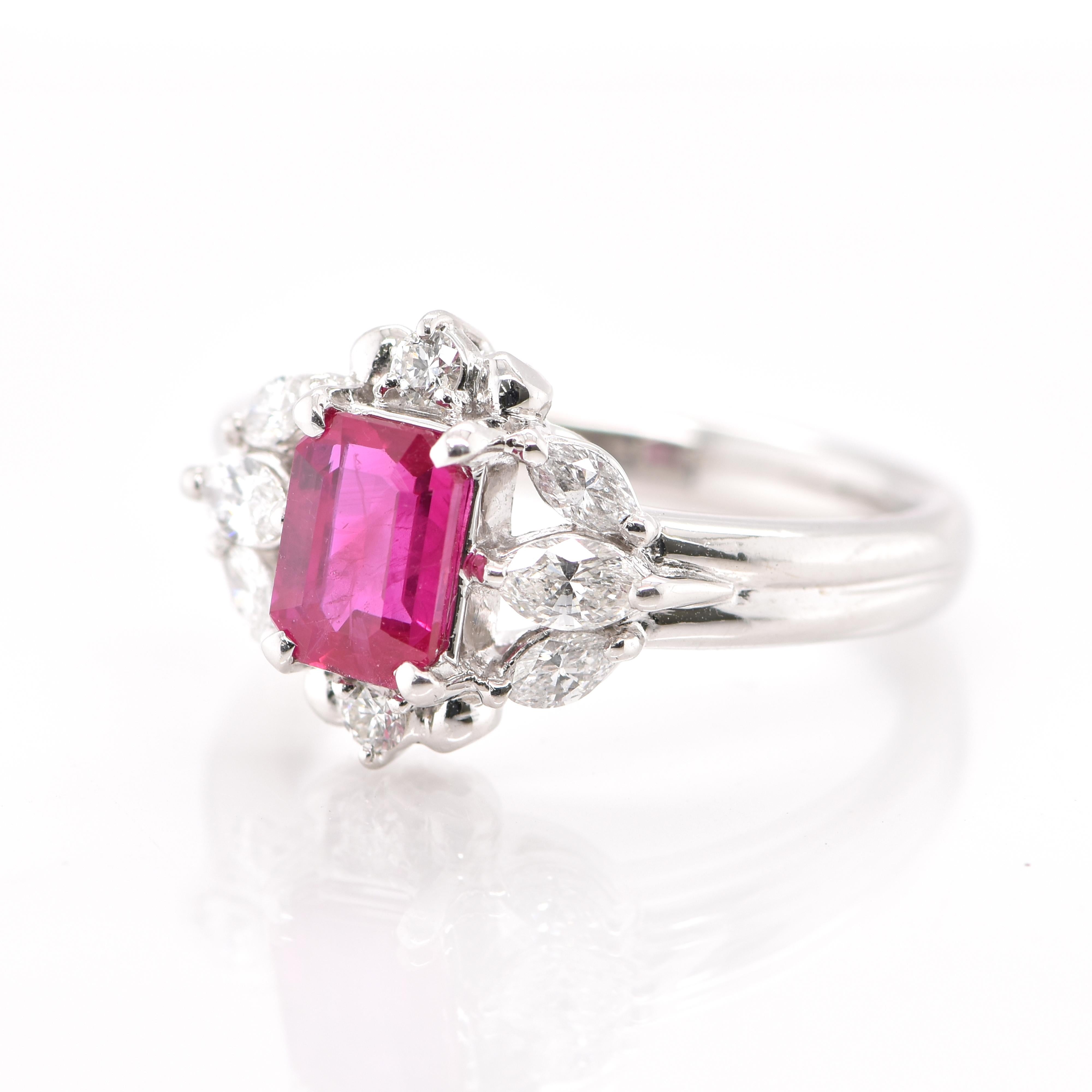 A beautiful Ring featuring a 1.47 Carat Natural Ruby and 0.50 Carats of Diamond Accents set in Platinum. Rubies are referred to as 