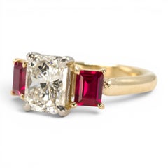 1.47 carat Radiant Cut Diamond Three Stone Engagement Ring with Rubies