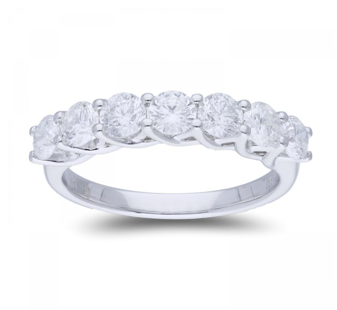 An amazing round diamond eternity ring set with 7 round cut diamonds. 
The diamonds weight is 1.46 Carat, each diamond weight 0.21 Carat.
The Half Eternity rings is made to order, which means after receiving the order, we will specifically craft