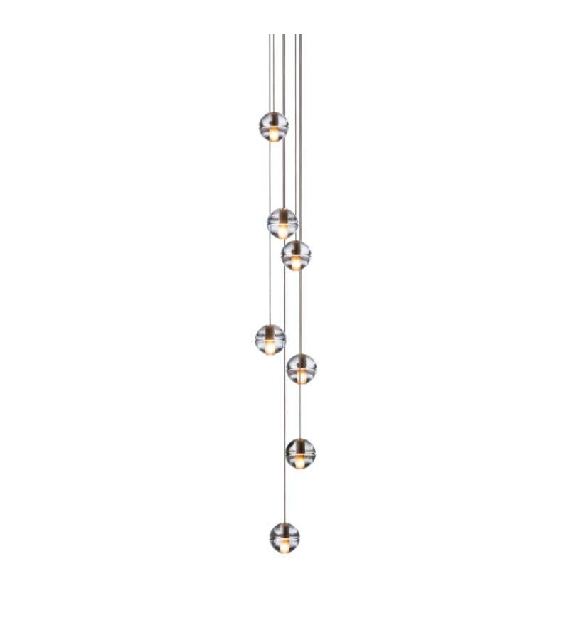 14.7 Chandelier lamp by Bocci
Dimensions: Diameter 20.3 x Height 300 cm 
Materials: Brushed nickel, cast glass, blown borosilicate glass, braided metal coaxial cable, electrical components, white powder-coated canopy.
Available in deep, shallow,