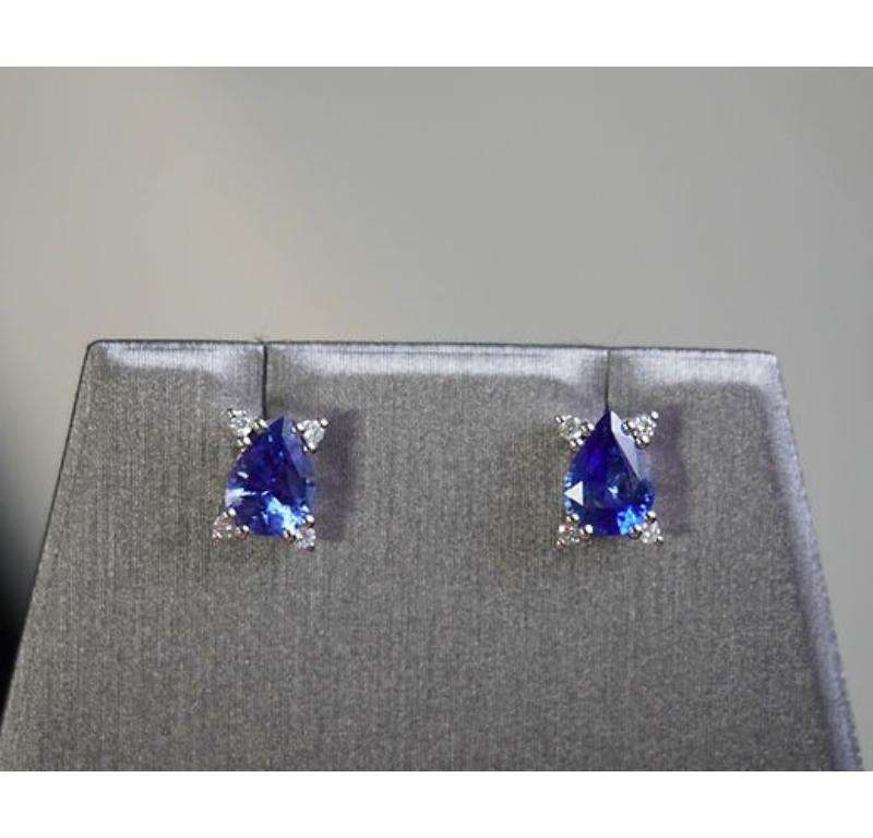 Sapphire Weight: 1.47 CT, Measurements: 7x5 mm, Diamond Weight: 0.08 CT 1.3 mm, Metal: 18K White Gold, Gold Weight: 2.21 gm, Shape: Pear, Color: Blue, Hardness: 9, Birthstone: September