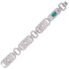 Antique GIA Cert 14.70 Carat Emerald, Diamond, and Pearl Edwardian Platinum Bracelet