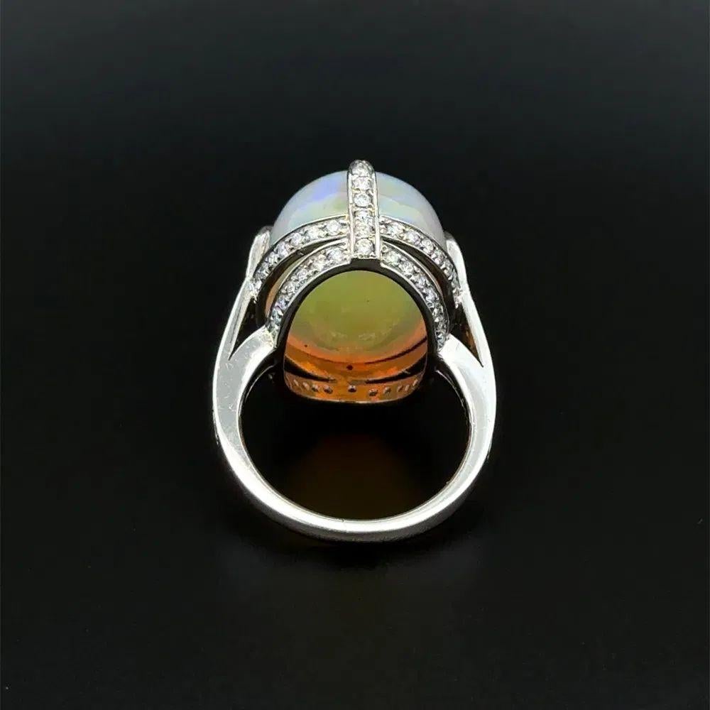 14.72 Carat Crystal Opal and RBC Diamond Platinum Vintage Statement Ring In Excellent Condition For Sale In Montreal, QC