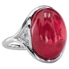 14.bague en platine à main droite avec cabochon en rhodonite de 73 carats par Leon Mege