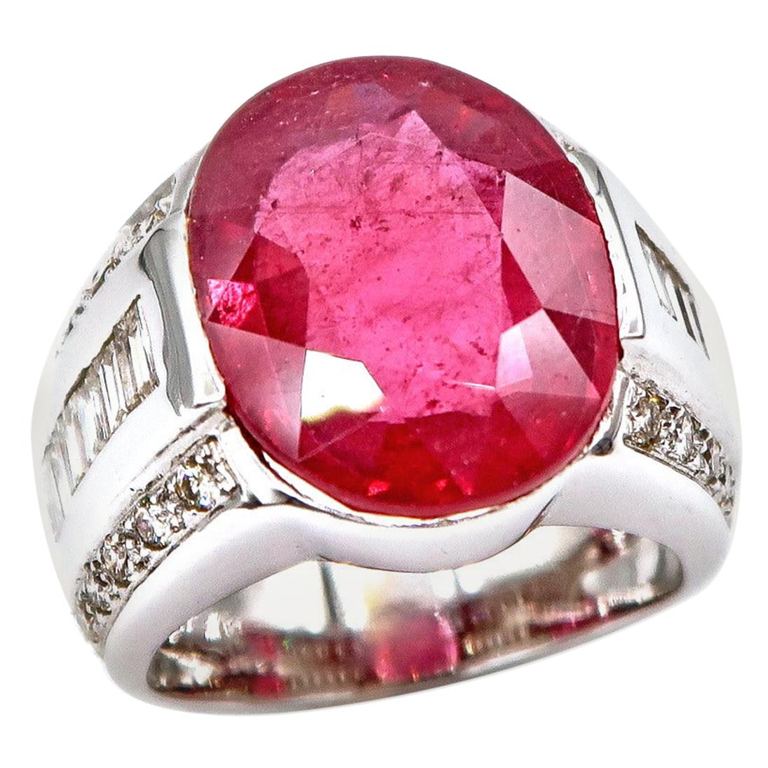 14.73 Carat Oval Ruby Ring in 18K White Gold with Baguette and Brilliant Round Diamond on the Sides

Ring Size: 57 / US 8 

Ruby: 14.19 ct
Diamond: 1.0 ct
Gold: 18K Gold, 14.729 g