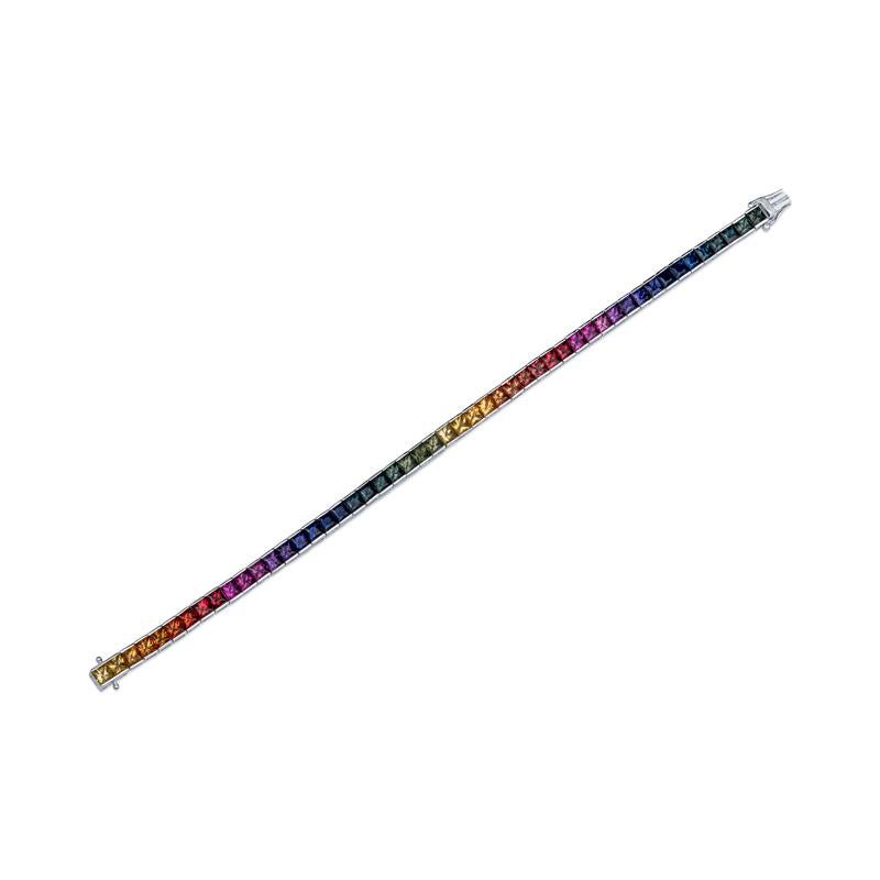 This exquisite bracelet features 14.73 carats of vibrant, natural princess cut rainbow sapphires, elegantly channel-set in lustrous 14 karat white gold. With a length of 7.00 inches, it’s the perfect accessory to add a splash of color to any outfit.