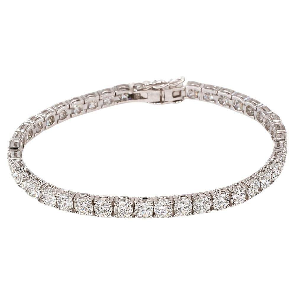 Pulsera de tenis con diamantes redondos brillantes de 14,74 quilates en oro blanco de 18 quilates

Esta elegante pulsera de tenis exhibe 36 diamantes naturales redondos talla brillante perfectamente combinados, que suman un impresionante total de
