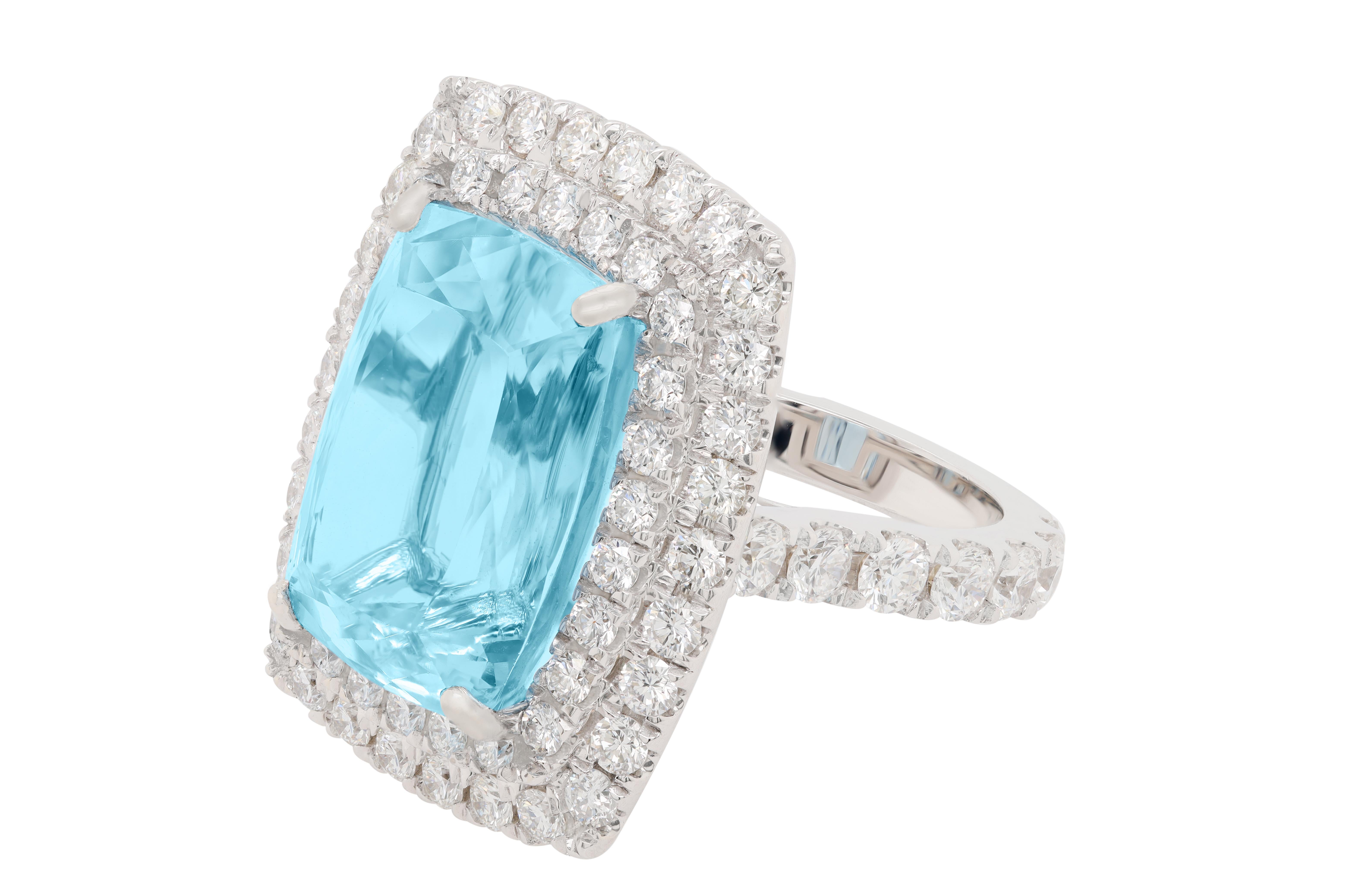 18K White Gold Aquamarine and Diamond Ring features 14.77 carat aquamarine, surrounded by 3.23 carats of diamonds. 
