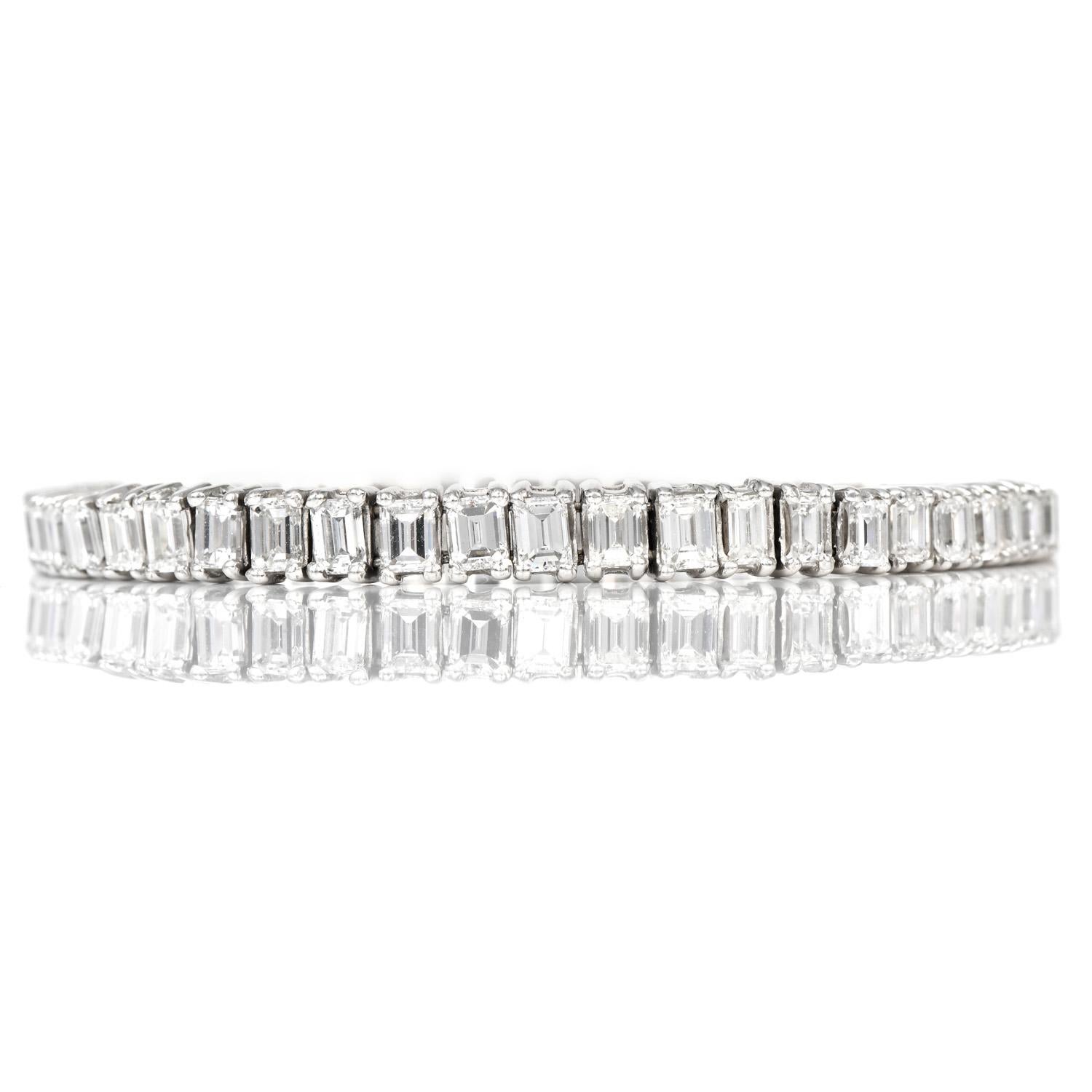 This opulent Diamond Bracelet was inspired in a line or Tennis Bracelet design

and crafted in Platinum.

Boasting of Sparkle and Brilliance, this bracelet features 53 Natural Emerald-cut 

Diamonds, gratuated,  from end to end weighing appx 14.79