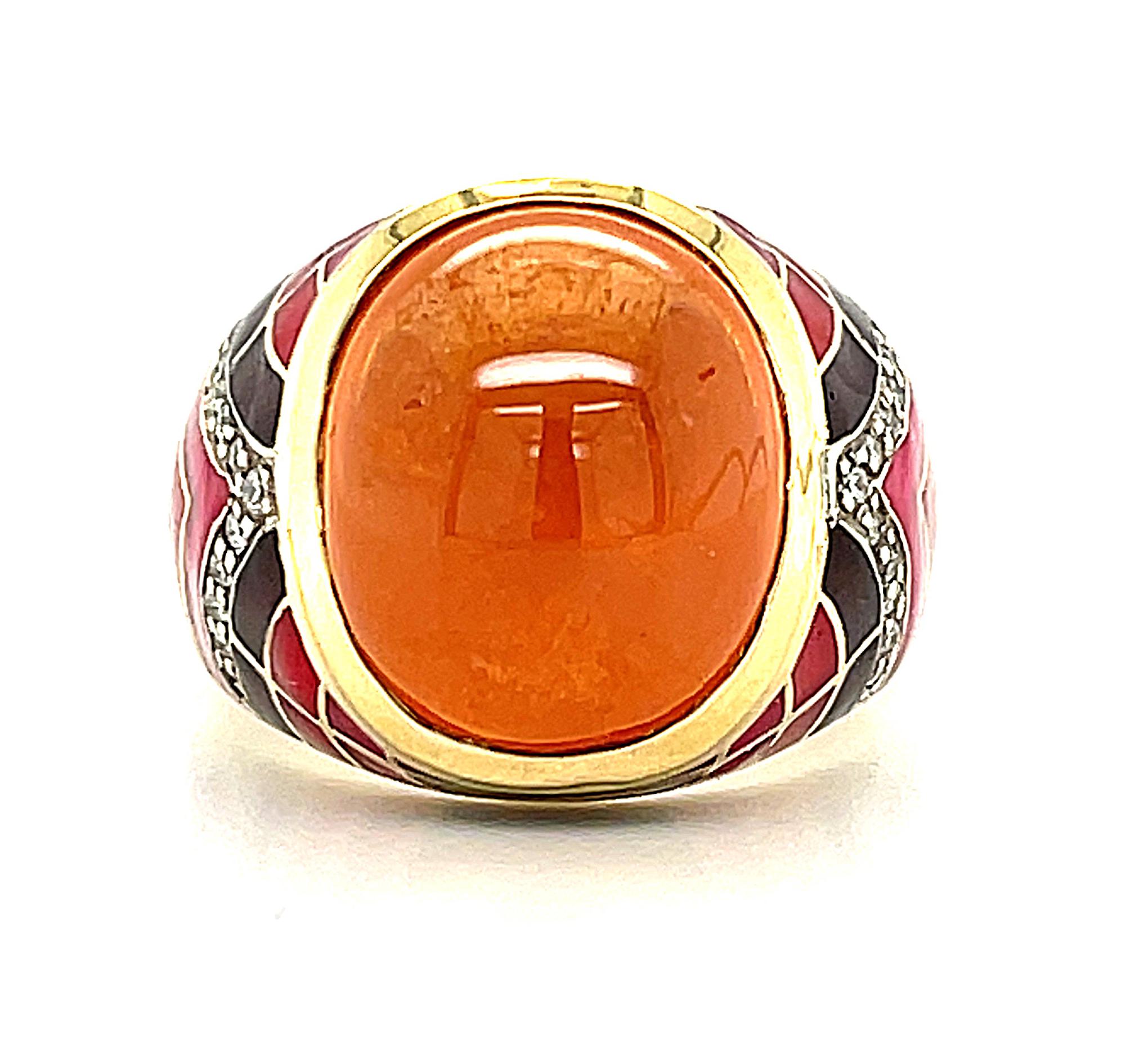 This beautifully designed ring features a large oval spessartite garnet cabochon weighing 14.79 carats that is the color of a bright mandarin orange, hence its nickname, 