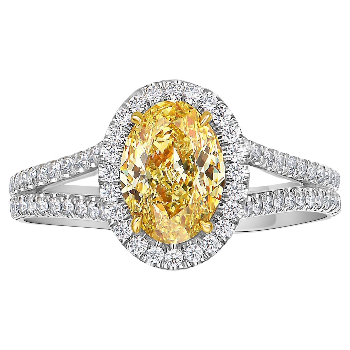 1.47ct GIA Fancy Intense Yellow Oval Diamond Ring For Sale