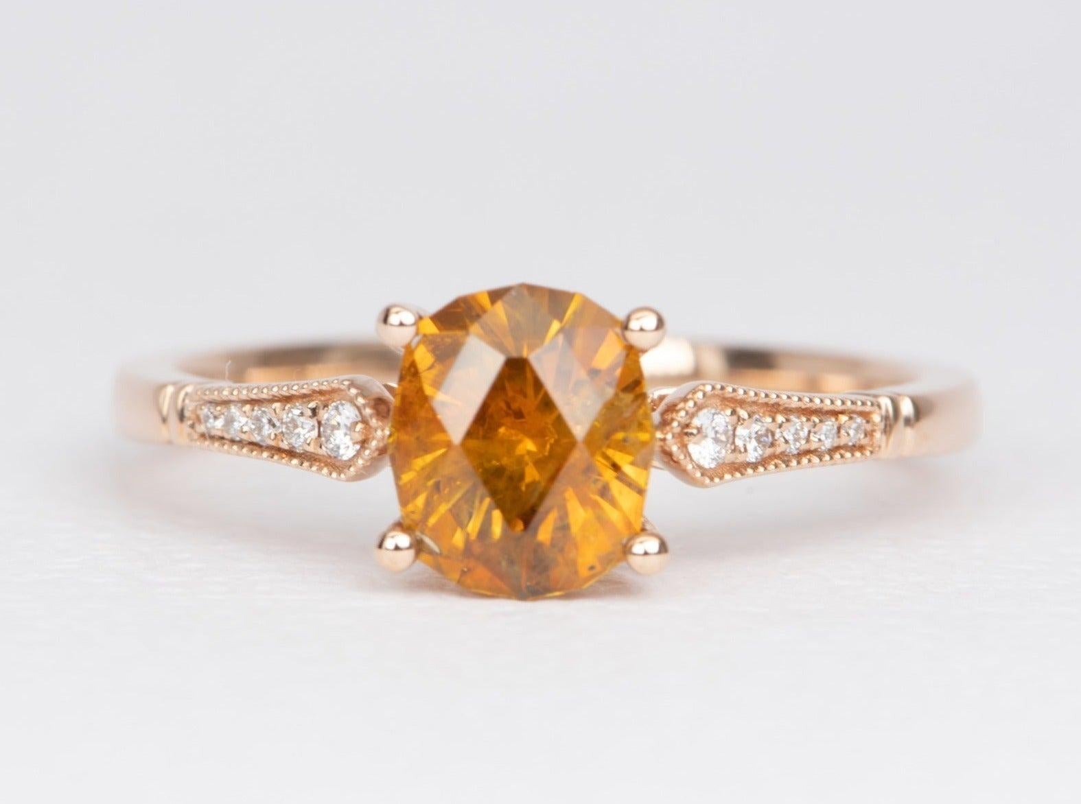 ♥ Solid 14k rose gold ring set with a beautiful oval-shaped orange Montana sapphire with diamond band
♥ Gorgeous orange color!
♥ The item measures 7.2 mm in length, 6.7 mm in width, and stands 5.6 mm from the finger

♥ US Size 7 (Free resizing up or