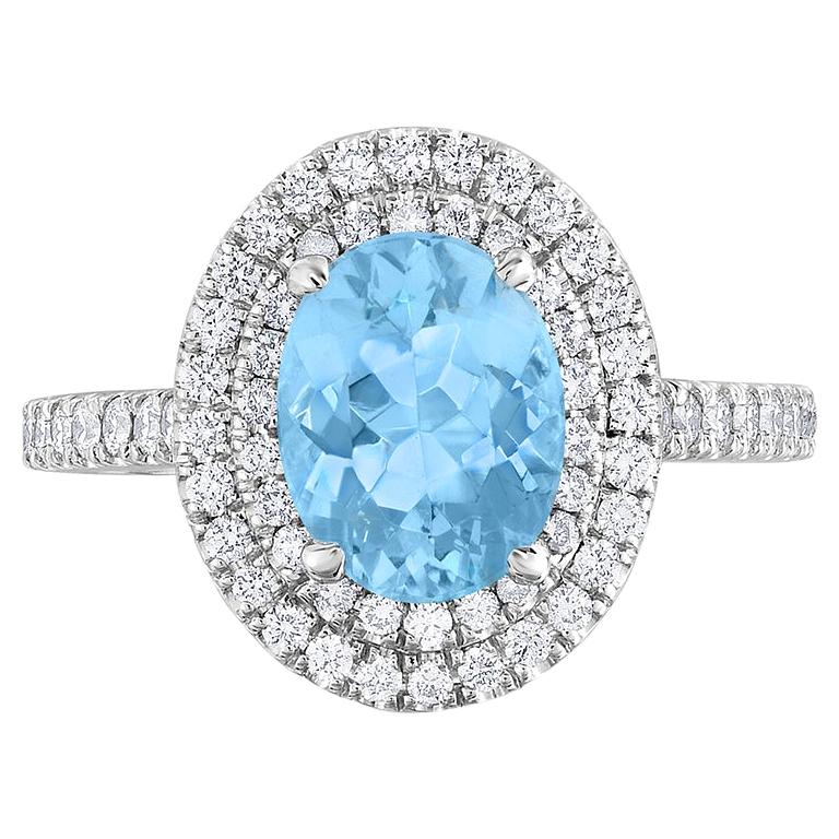 1.47ct. Oval Aquamarine Conflict Free Diamond Platinum Halo Cocktail Ring For Sale