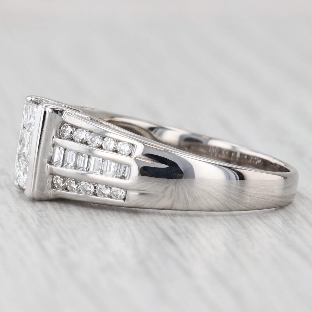 Gemstone Information:
- Natural Diamonds -
Total Carats - 0.75ctw
Cut - Princess
Color - G - H
Clarity - VS2 - SI1

- Natural Diamonds -
Total Carats - 0.32ctw
Cut - Round Brilliant
Color - G - H
Clarity - SI1 - I1 

- Natural Diamonds -
Total