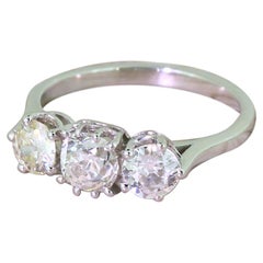 1.48 Carat Cushion and Round Old Cut Diamond Platinum Trilogy Ring