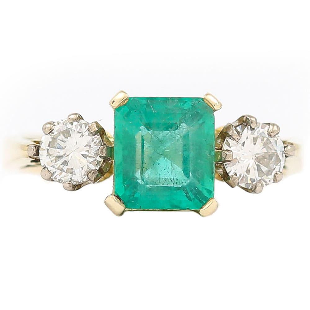 Modern 1.48 Carat Emerald and 0.60 Carat Diamond Three Stone Ring 18 Karat Yellow Gold
