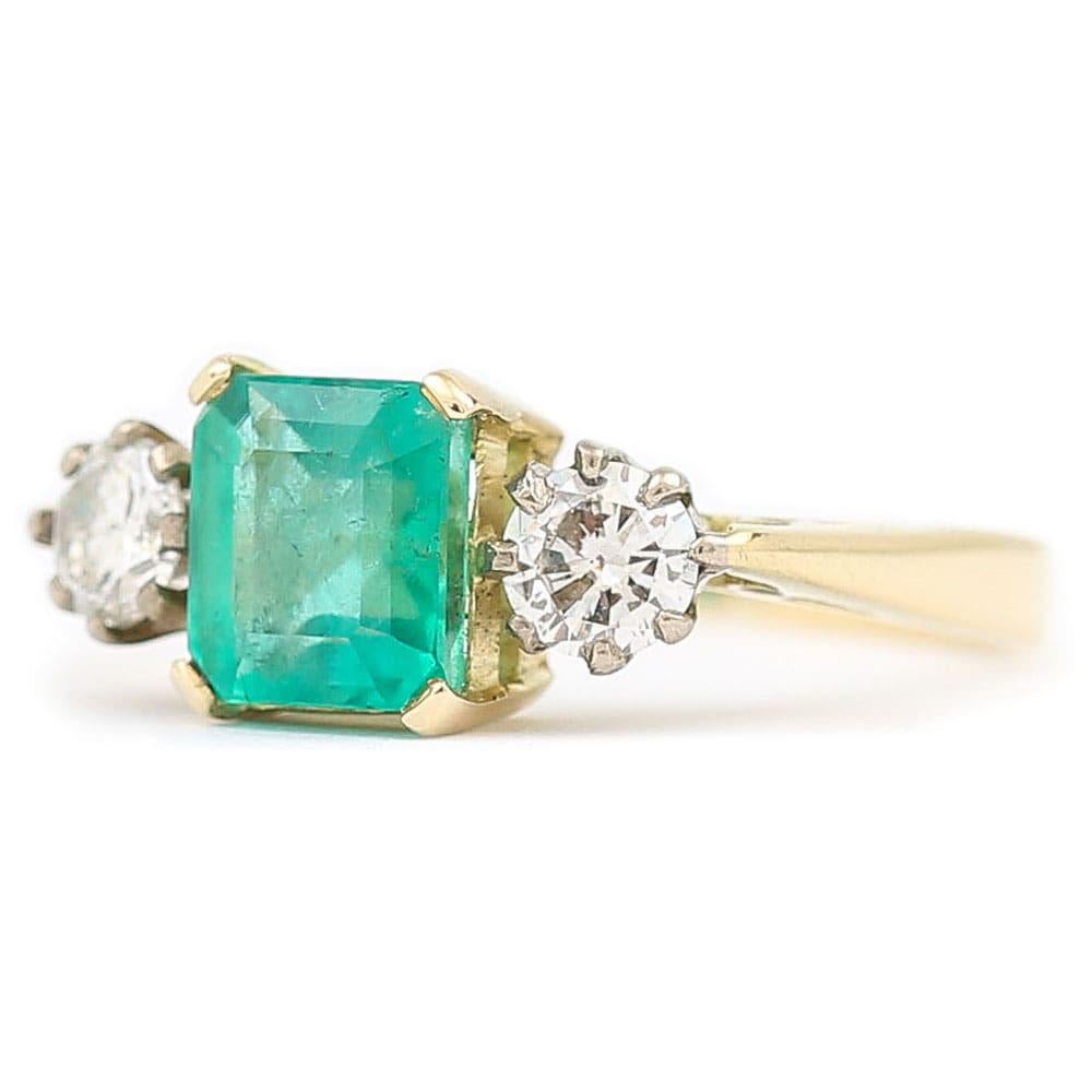 Emerald Cut 1.48 Carat Emerald and 0.60 Carat Diamond Three Stone Ring 18 Karat Yellow Gold