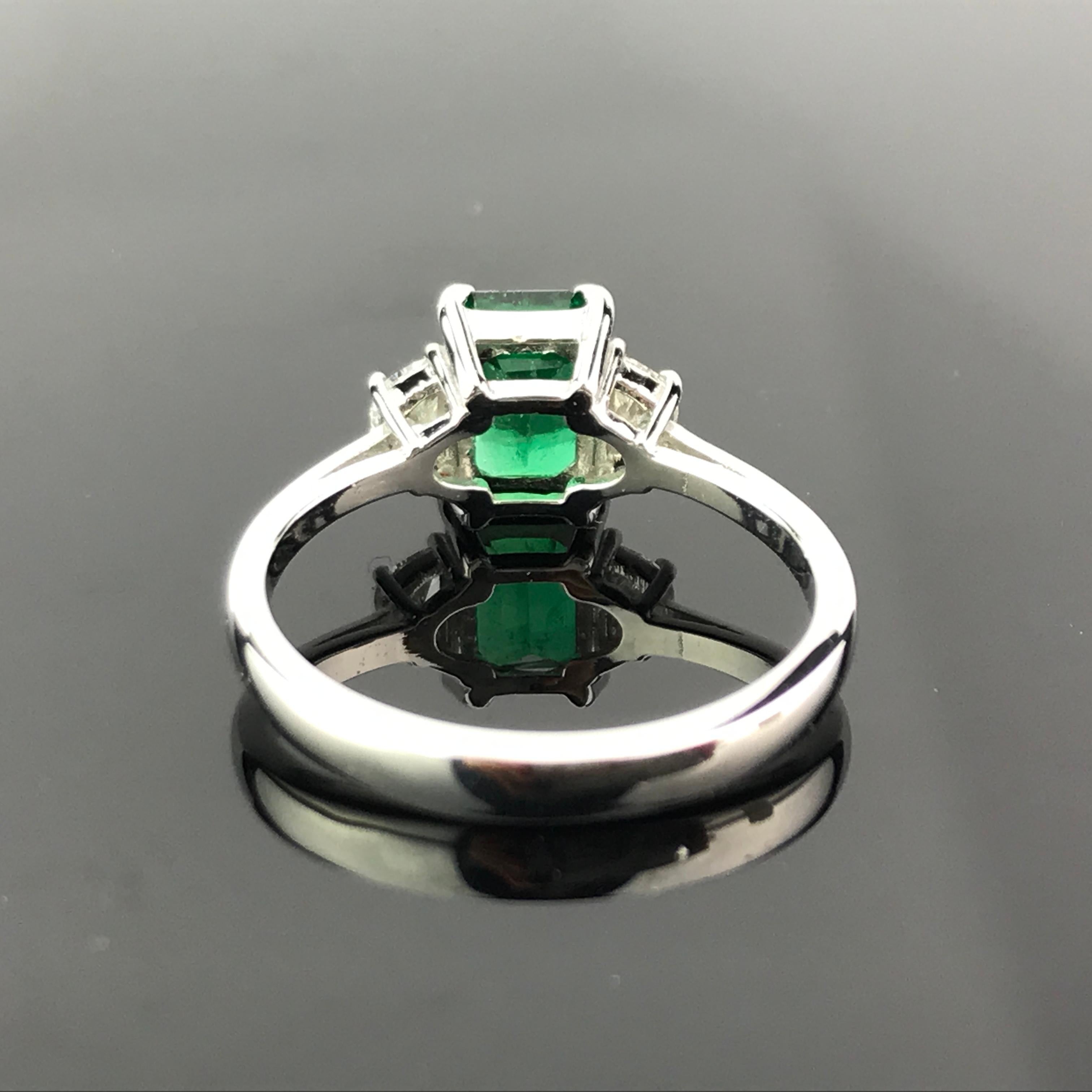 Modern 1.48 Carat Emerald and Diamond Three-Stone Engagement Ring
