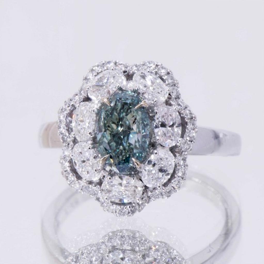 1.48 Carat Natural GIA Certified Vivid Bluish Green Diamond Ring.

Stunning 1.48 Carat Rare Blue Diamond.