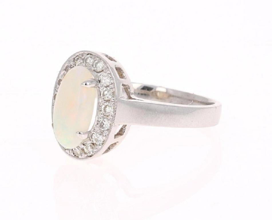 Modern 1.48 Carat Oval Cut Opal Diamond White Gold Cocktail Ring For Sale