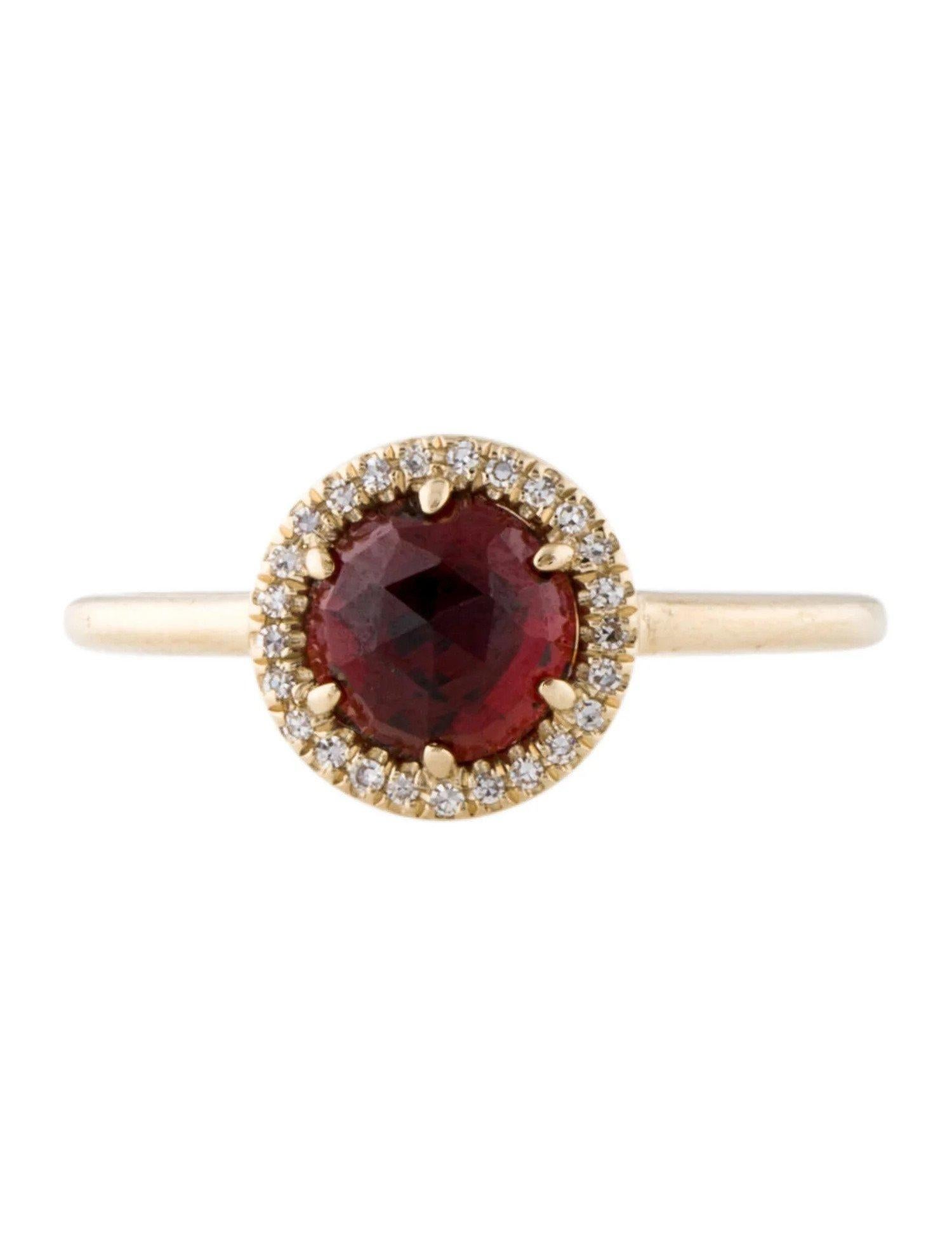 This Garnet & Diamond Ring is a stunning and timeless accessory that can add a touch of glamour and sophistication to any outfit. 

This ring features a 1.48 Carat Garnet, with a Diamond Halo comprised of 0.06 Carats of Single Cut Round White