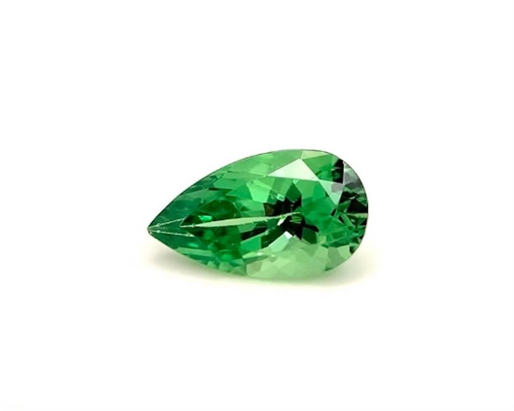 This pretty tsavorite garnet checks all the boxes if you're looking for a perfect green pear! Beautiful grass green in color and exquisitely cut, this beauty is full of life and has all the qualities of a fine gem. It weighs 1.48 carat and is