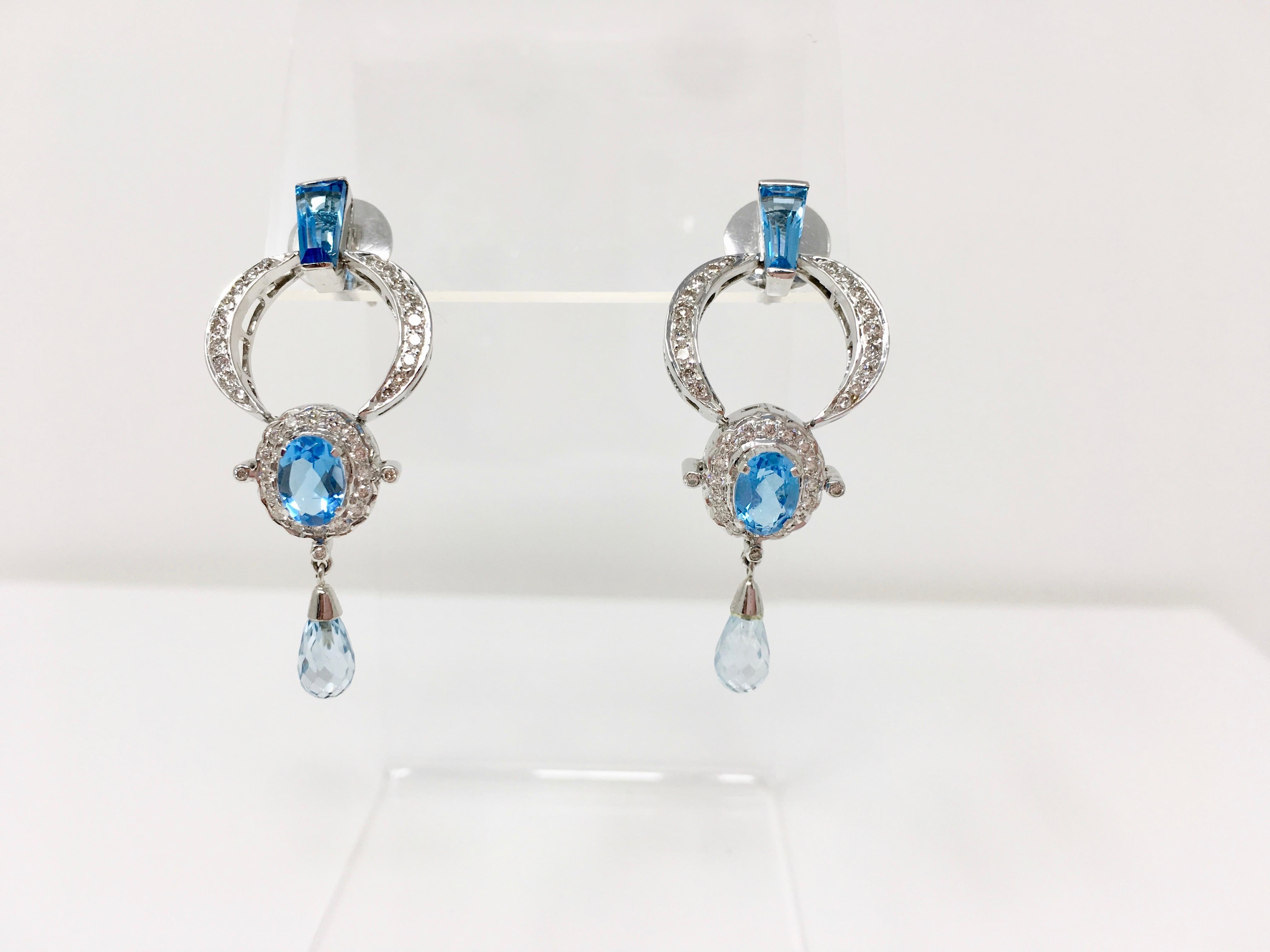 Contemporary 1.48 Carat White Round Brilliant Diamond and 13.25 Carat Blue Topaz Pendant Set For Sale