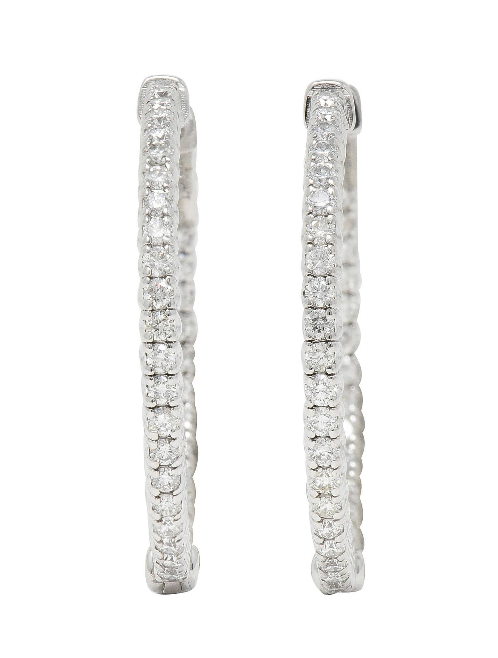 1.48 CTW Diamond 14 Karat White Gold Inside Outside 30 MM Hoop Earrings In Excellent Condition For Sale In Philadelphia, PA