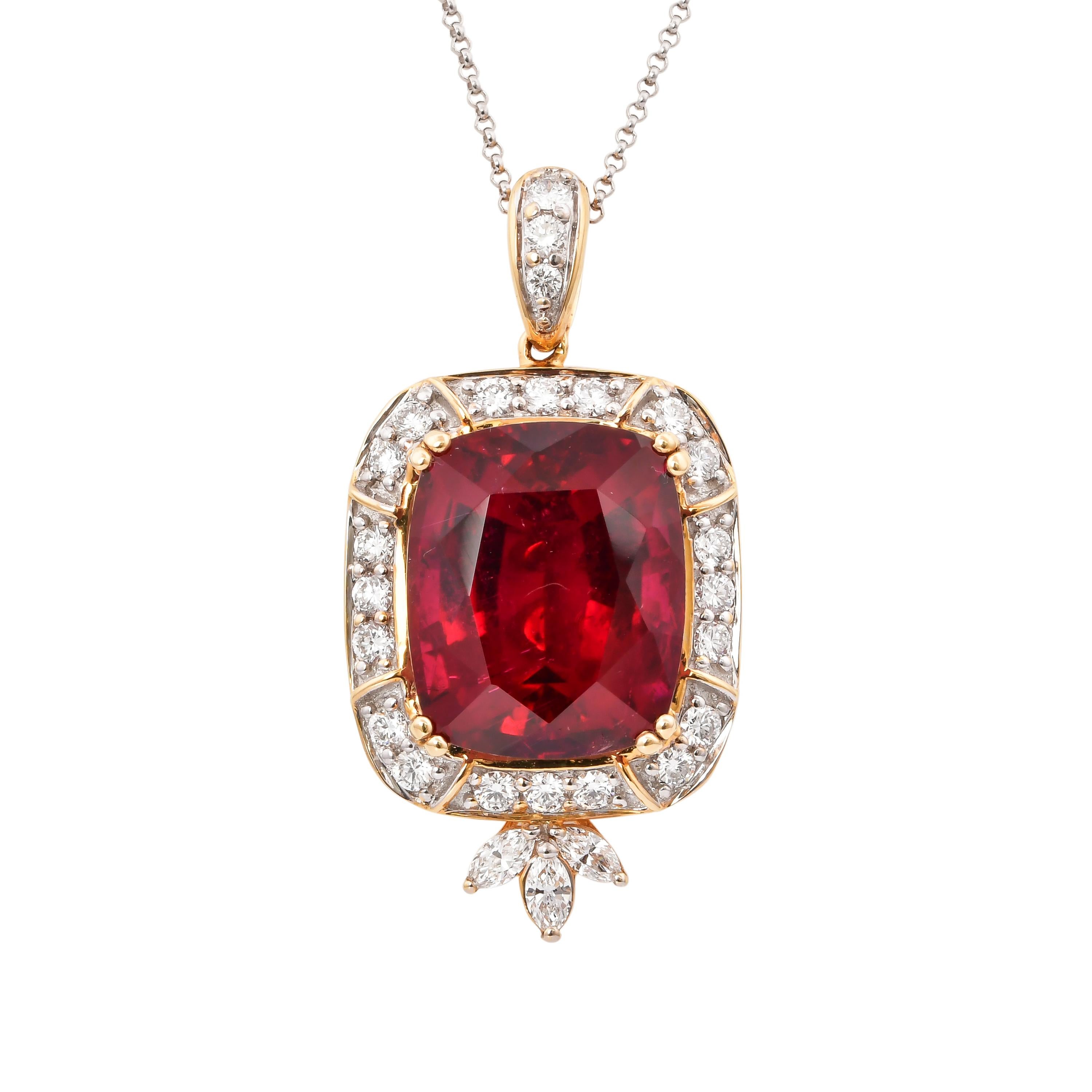 This collection features the most radiant Rubellite tourmalines. These gemstones show a magnificent and regal deep red Colour, and the yellow gold and diamond accents makes these pieces a true showstopper. 

Classic Rubellite tourmaline pendant in