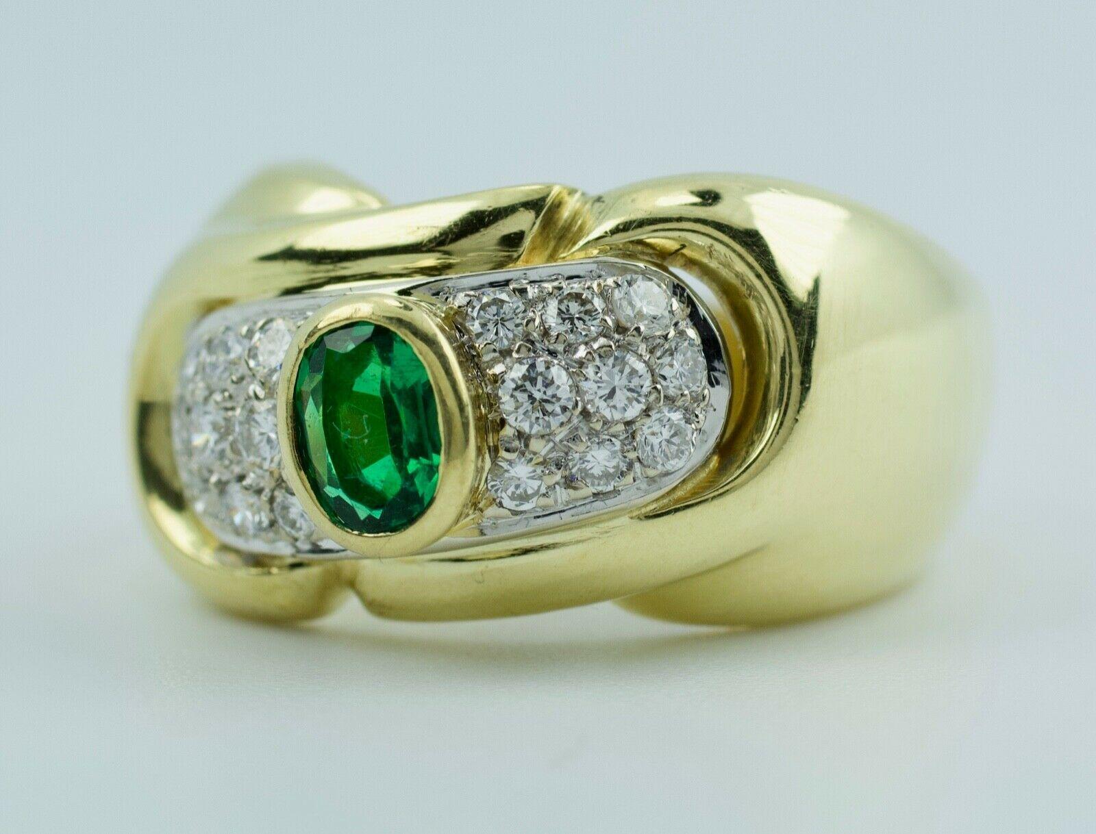 Vintage 18k Yellow Gold Oval Emerald With Round White Diamonds Ring
9.0 Grams
Ring Size 7.5
18 White Round Cut Diamonds 0.36 Carats Total Weight
Color: E-F Clarity: VS1-2
1 Oval Cut Green Emerald 5x4mm
the emerald in this ring is a very clean gem