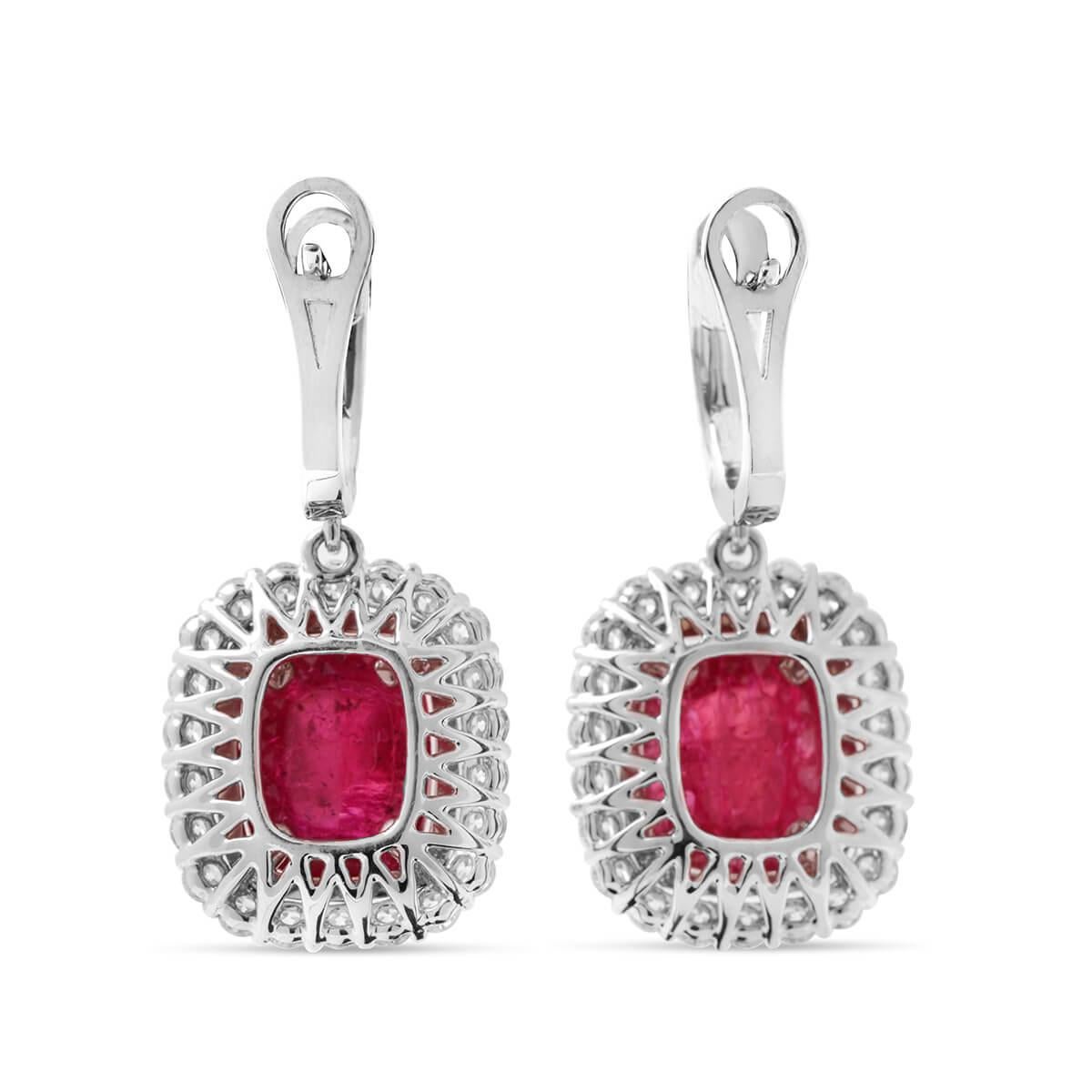 Natural, unheated Ruby Earrings. 

18 Karat White Gold. 

STONE TYPE	Ruby
DISPLAY COLOR	Red
SHAPE	Cushion
WEIGHT (MAIN STONE)	12.11
SIDE STONES WEIGHT (CT.)	2.73
ORIGIN	Tanzania
GOLD WEIGHT (G)	9.10
MEASUREMENTS	11.01x8.86x6.38