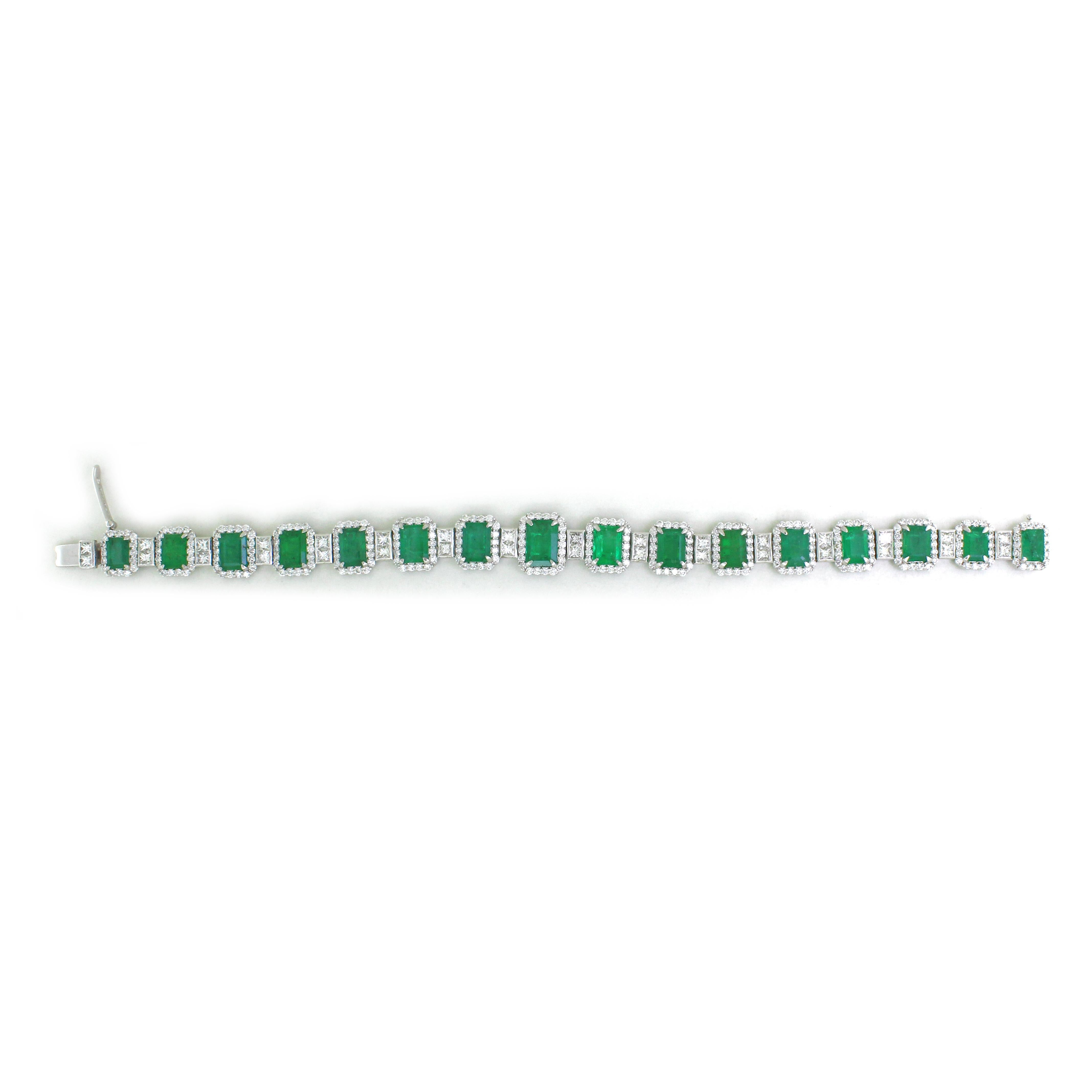 Exuding timeless elegance, this 18K white gold bracelet is a true work of art. It boasts 16 mesmerizing emerald-cut emeralds, totaling a remarkable 14.85 carats, each meticulously cradled in secure 4-prong settings. The lush green of the emeralds