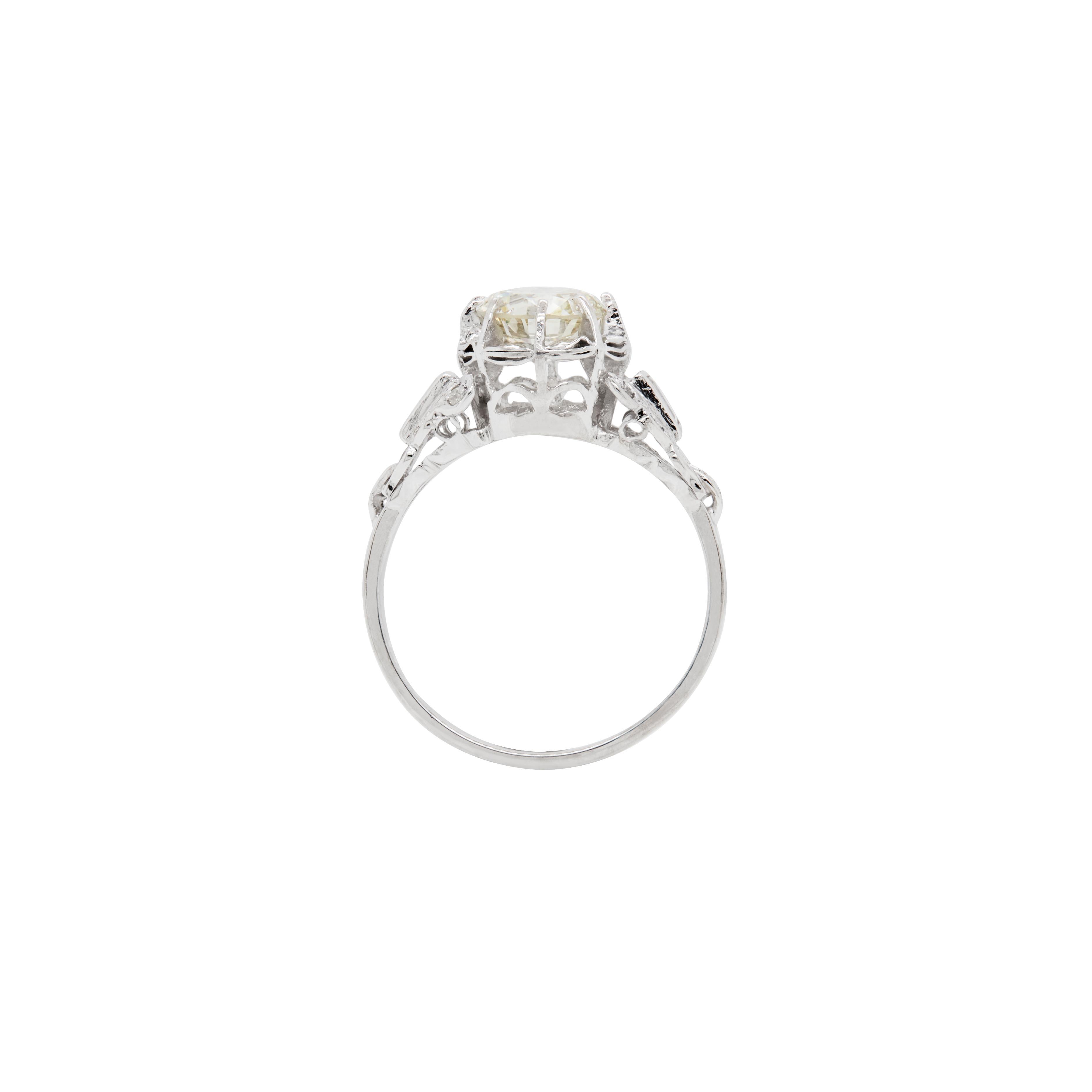 Introducing a charming engagement ring that promises to stand out from the crowd and enchant with its unique vintage beauty.

Dating back to circa 1950's, this exquisite ring is crafted in luxurious platinum and features an impressive 1.48ct old