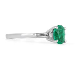 1.48tcw Oval Colombian Emerald & Tapered Baguette Diamond Platinum Ring